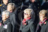 Remembrance Sunday Cenotaph March Past 2013: E28 - Queen Alexandra's Royal Naval Nursing Service..
Press stand opposite the Foreign Office building, Whitehall, London SW1,
London,
Greater London,
United Kingdom,
on 10 November 2013 at 11:47, image #582