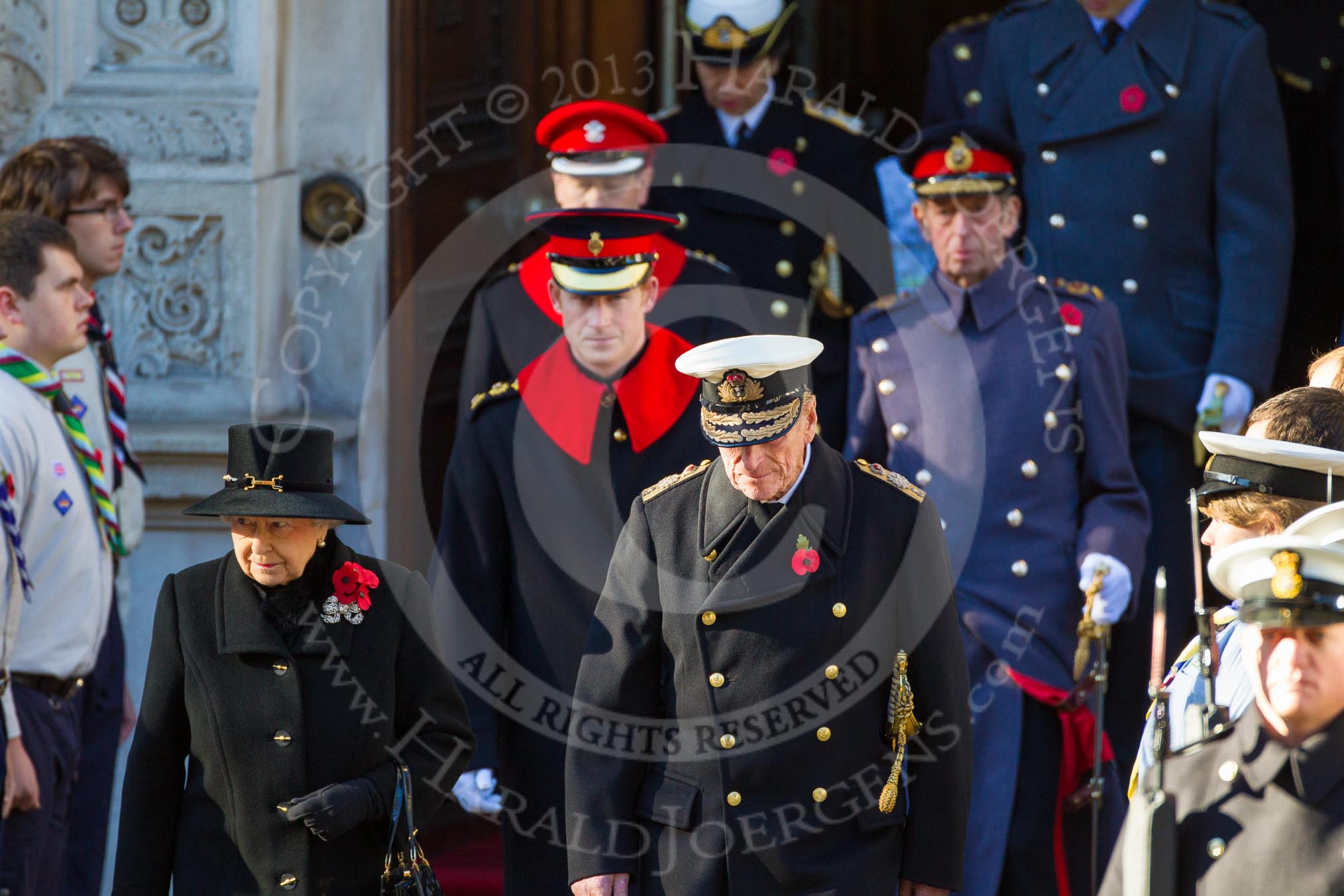 HM The Queen and HRH The Duke of Edinburgh, HRH Prince Henry of Wales emerging from the Foreign and Commonwealth Building.