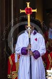 The Choir, led by the Cross Bearer, Johan de Silva, emerges from the Foreign- and Commonwealth Building.