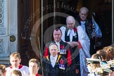 The Choir is followed by the Serjeant of the Vestry, The Chaplain of the Fleet (The Reverend Scott Brown), the Sub-Dean of Her Majesty's Chapel Royal (the Reverend Prebendary William Scott), and the Dean of HM Chapel Royal, the Bishop of London.