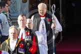 The Serjeant of the Vestry, The Chaplain of the Fleet (The Reverend Scott Brown), the Sub-Dean of Her Majesty's Chapel Royal (the Reverend Prebendary William Scott), and the Dean of HM Chapel Royal, the Bishop of London emerging from the Foreign- and Commonwealth Building.