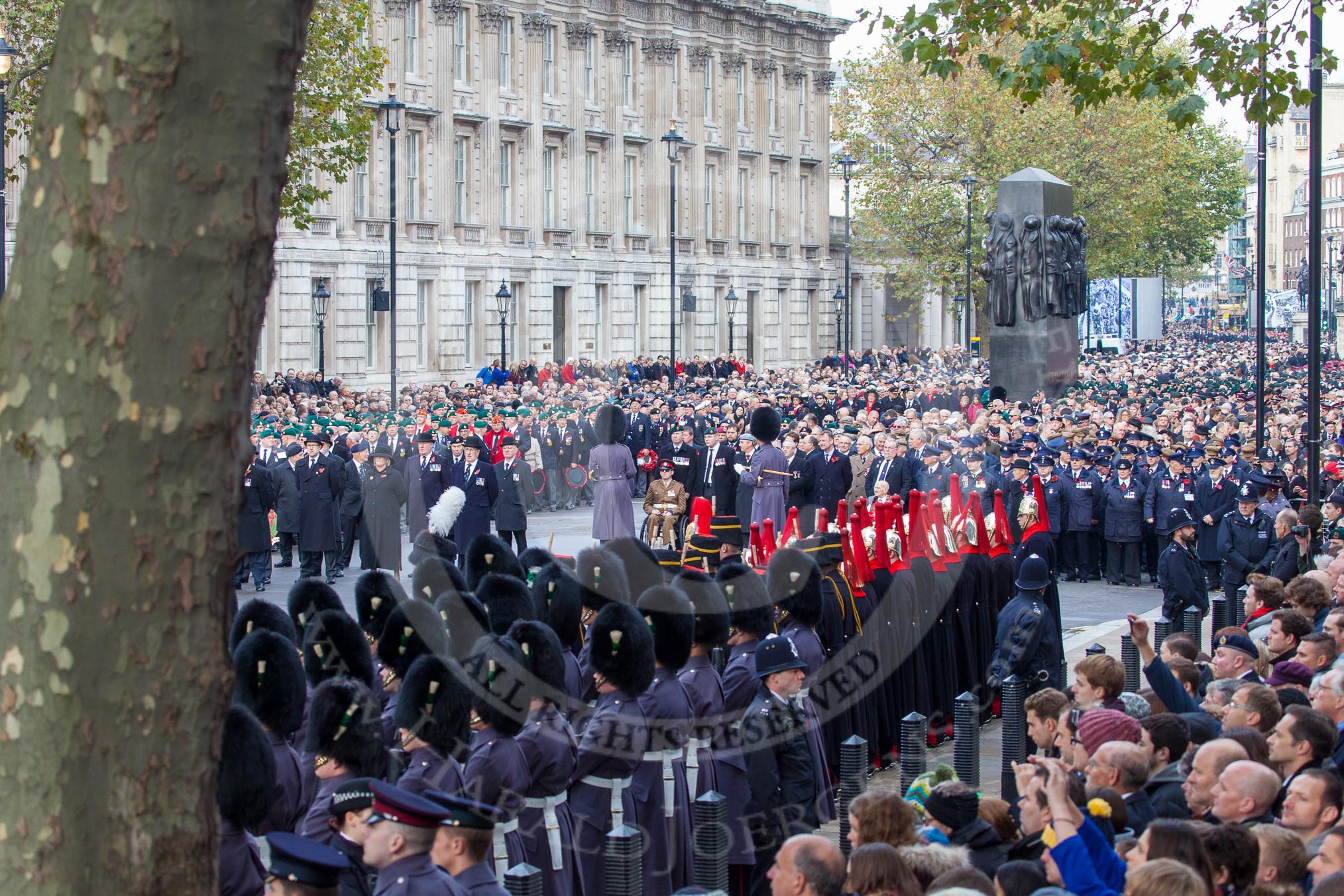 Remembrance Sunday at the Cenotaph in London 2014: Over 10,000 veterans waiting for the start of the March Past.
Press stand opposite the Foreign Office building, Whitehall, London SW1,
London,
Greater London,
United Kingdom,
on 09 November 2014 at 11:31, image #1