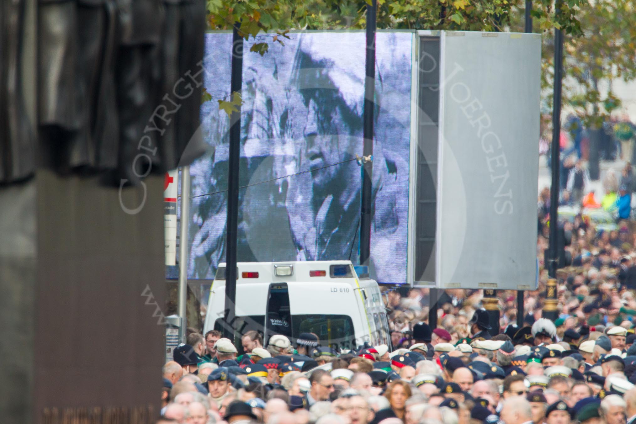 Remembrance Sunday at the Cenotaph in London 2014: The eastern end of Whitehall, with the two huge television screes for the BBC live broadcast.
Press stand opposite the Foreign Office building, Whitehall, London SW1,
London,
Greater London,
United Kingdom,
on 09 November 2014 at 11:31, image #2