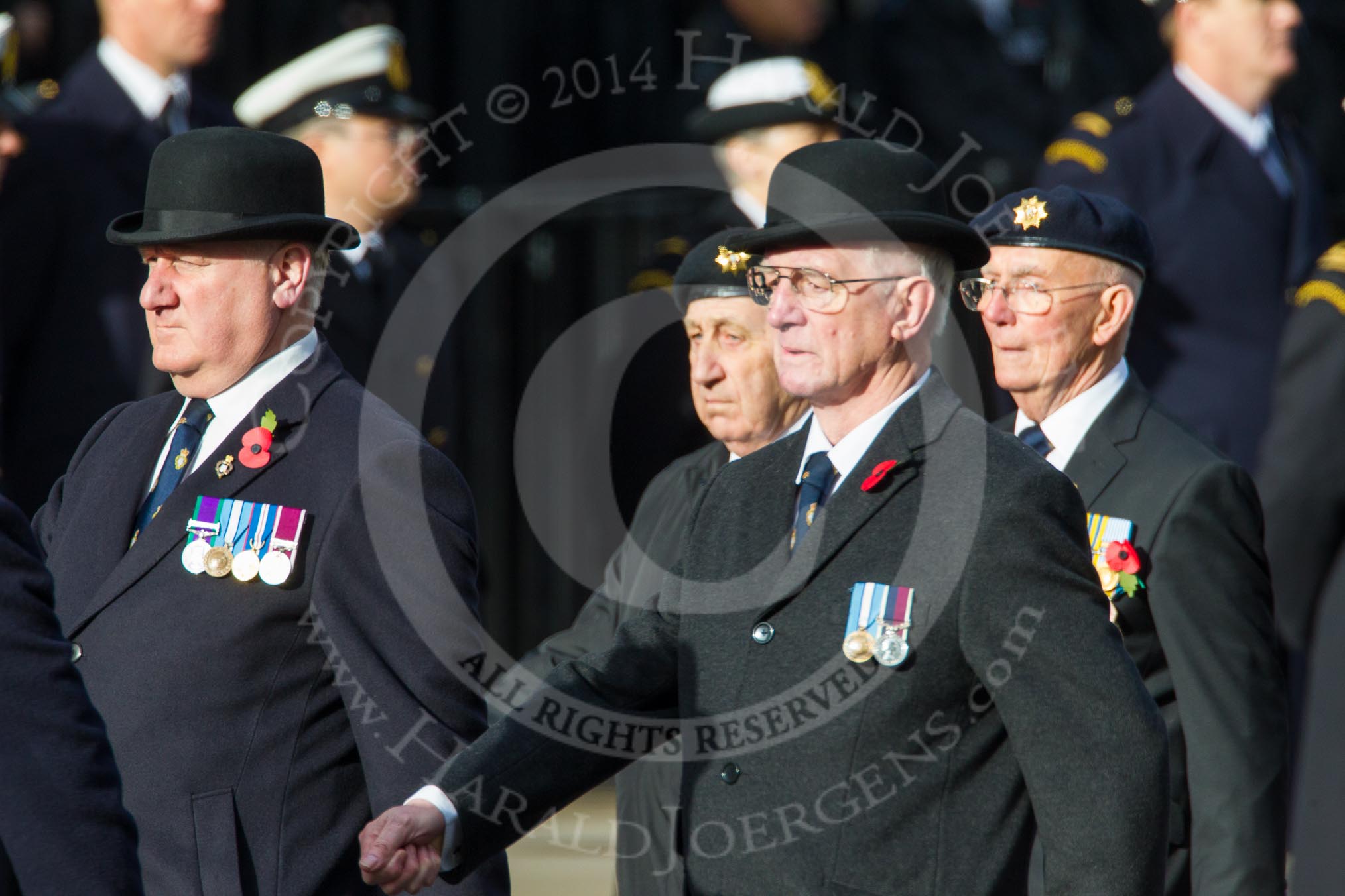 Remembrance Sunday at the Cenotaph in London 2014: Members of the Royal British Legion (?) leading the March Past.
Press stand opposite the Foreign Office building, Whitehall, London SW1,
London,
Greater London,
United Kingdom,
on 09 November 2014 at 11:37, image #13