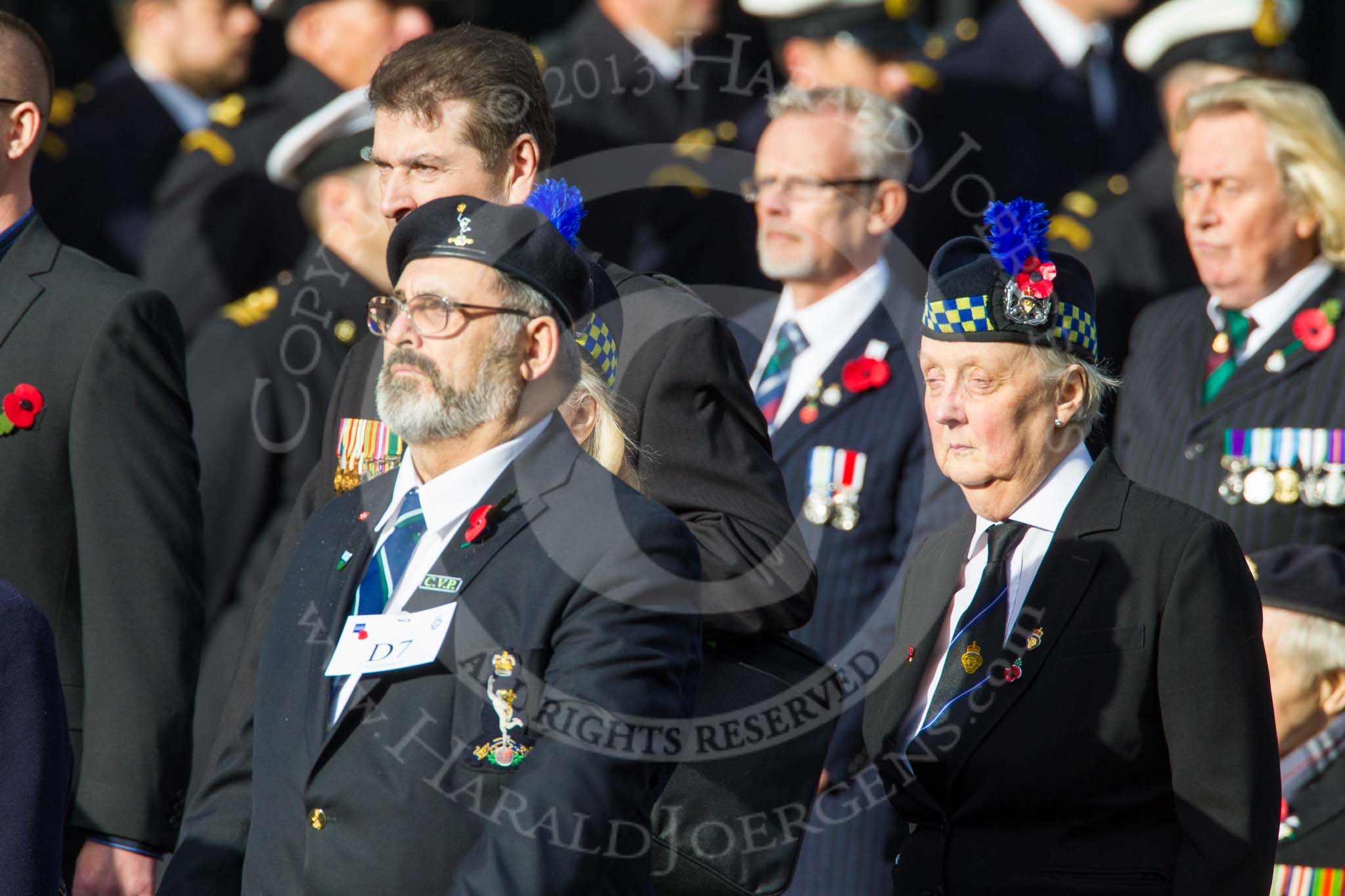 Remembrance Sunday at the Cenotaph in London 2014: Group D7 - The Royal British Legion Poppy Factory.
Press stand opposite the Foreign Office building, Whitehall, London SW1,
London,
Greater London,
United Kingdom,
on 09 November 2014 at 11:44, image #326