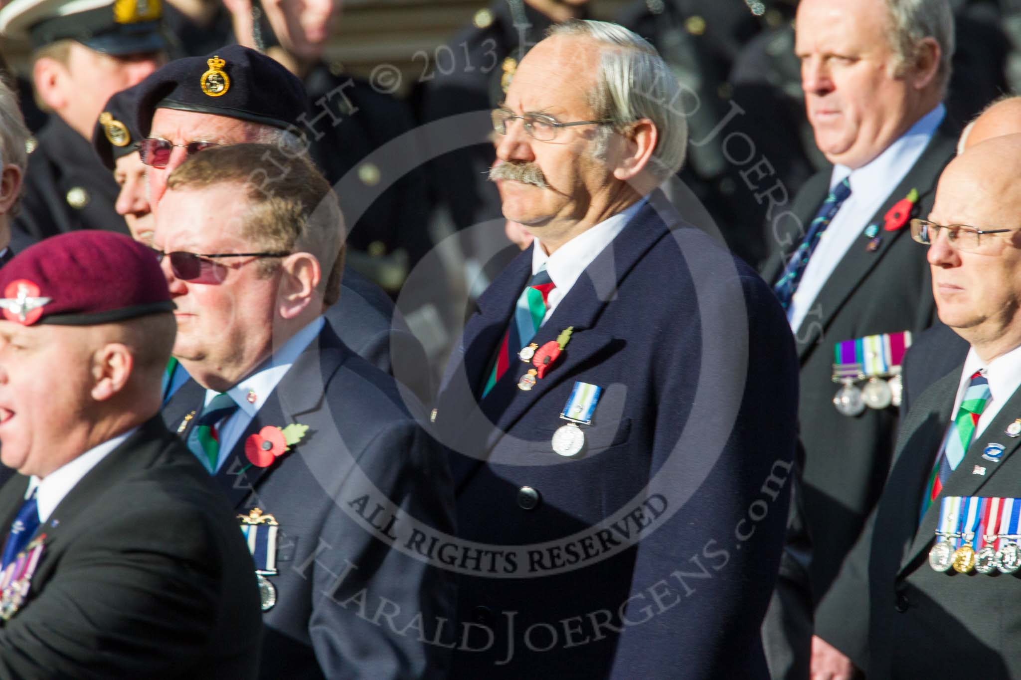 Remembrance Sunday at the Cenotaph in London 2014: Group D19 - South Atlantic Medal Association.
Press stand opposite the Foreign Office building, Whitehall, London SW1,
London,
Greater London,
United Kingdom,
on 09 November 2014 at 11:46, image #392