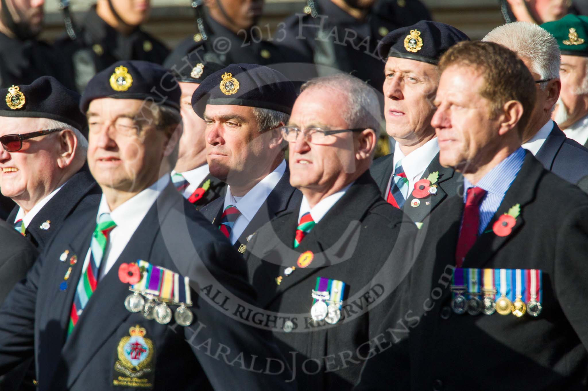 Remembrance Sunday at the Cenotaph in London 2014: Group D19 - South Atlantic Medal Association.
Press stand opposite the Foreign Office building, Whitehall, London SW1,
London,
Greater London,
United Kingdom,
on 09 November 2014 at 11:46, image #395