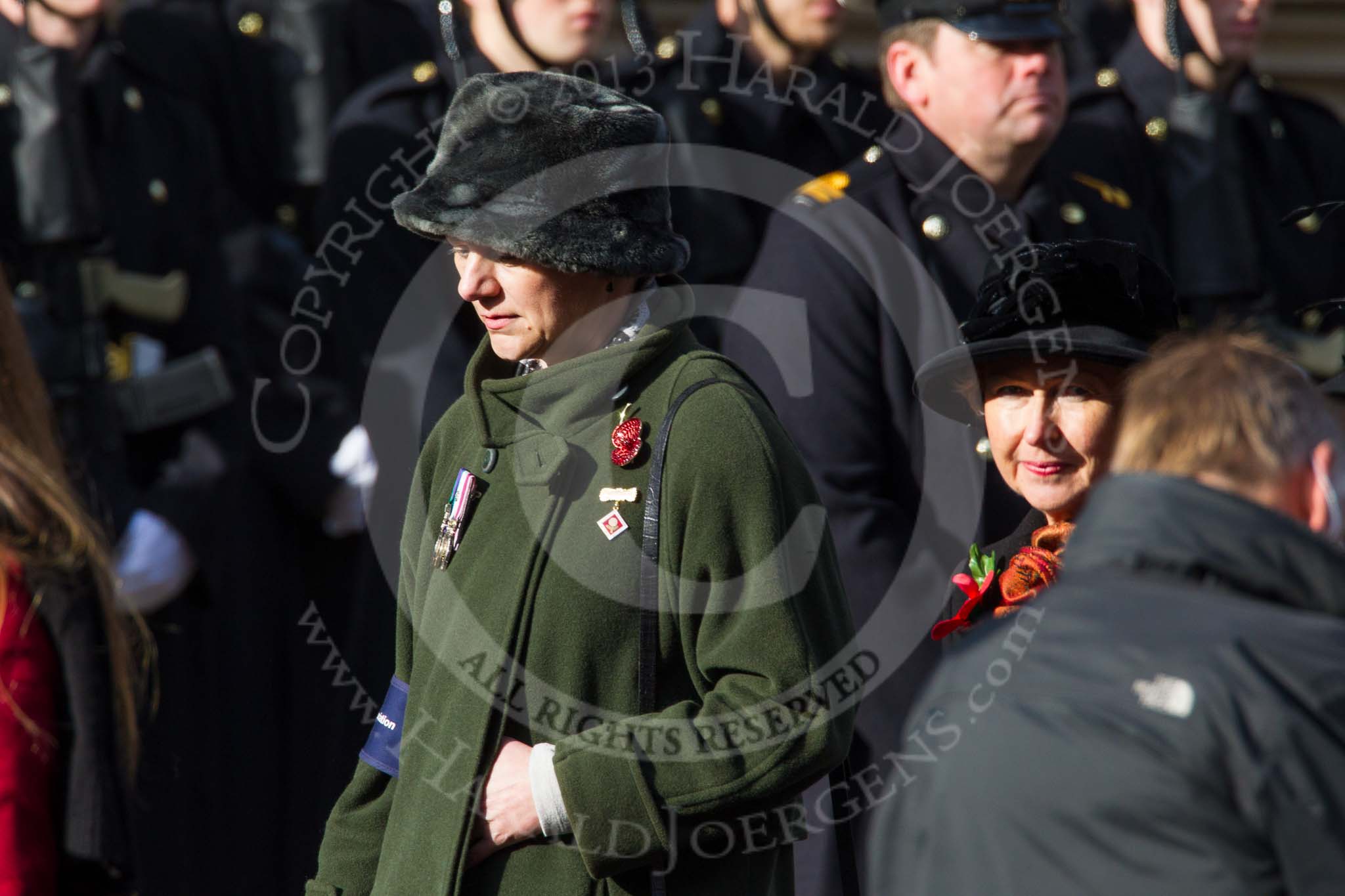 Remembrance Sunday at the Cenotaph in London 2014: Group D24 - War Widows Association.
Press stand opposite the Foreign Office building, Whitehall, London SW1,
London,
Greater London,
United Kingdom,
on 09 November 2014 at 11:46, image #429