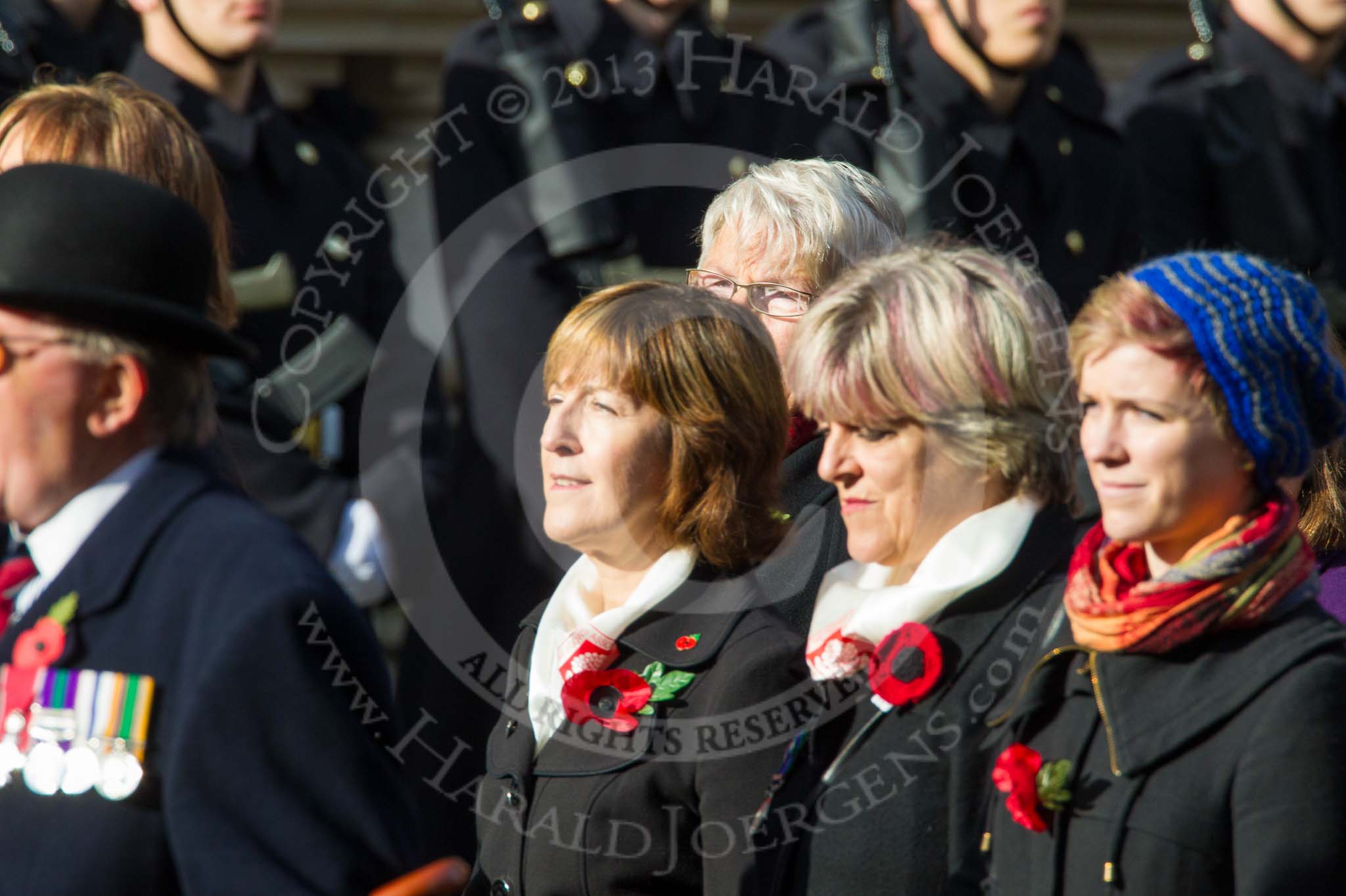 Remembrance Sunday at the Cenotaph in London 2014: Group D24 - War Widows Association.
Press stand opposite the Foreign Office building, Whitehall, London SW1,
London,
Greater London,
United Kingdom,
on 09 November 2014 at 11:47, image #444