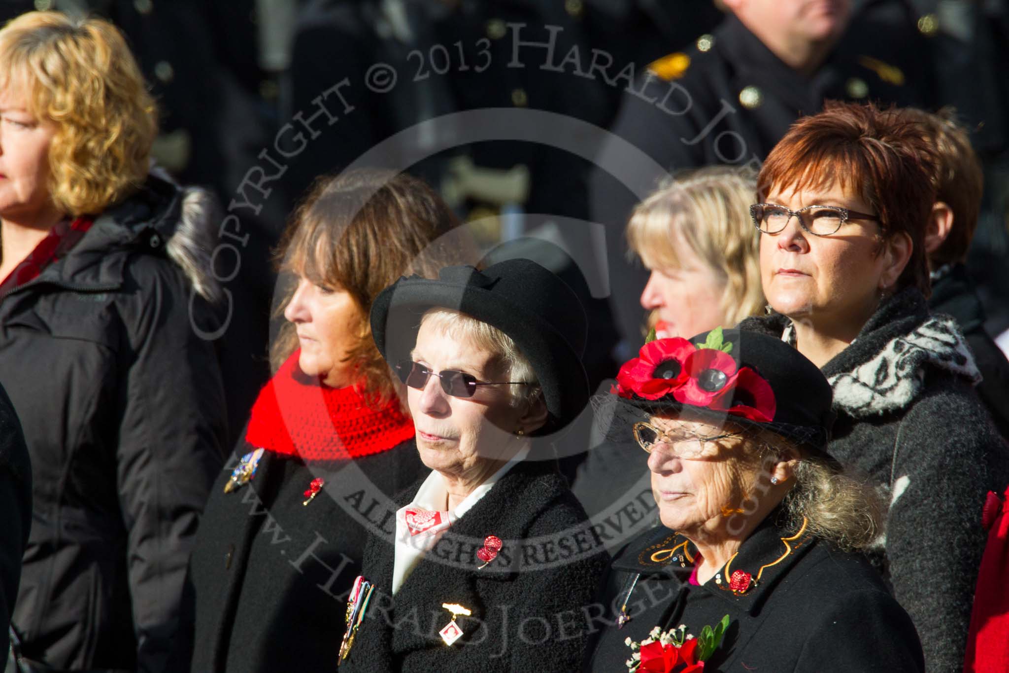 Remembrance Sunday at the Cenotaph in London 2014: Group D24 - War Widows Association.
Press stand opposite the Foreign Office building, Whitehall, London SW1,
London,
Greater London,
United Kingdom,
on 09 November 2014 at 11:47, image #449