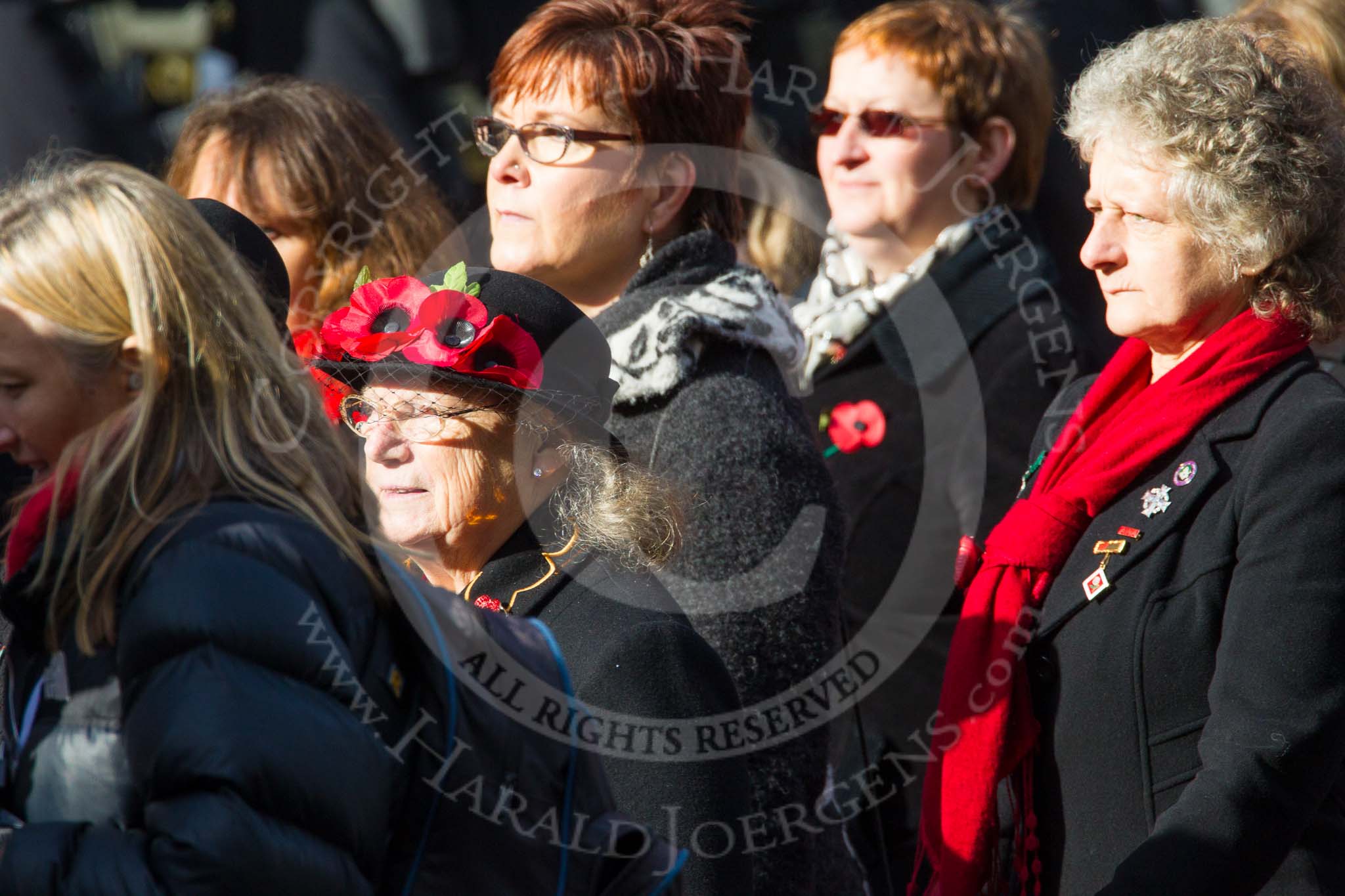 Remembrance Sunday at the Cenotaph in London 2014: Group D24 - War Widows Association.
Press stand opposite the Foreign Office building, Whitehall, London SW1,
London,
Greater London,
United Kingdom,
on 09 November 2014 at 11:47, image #452