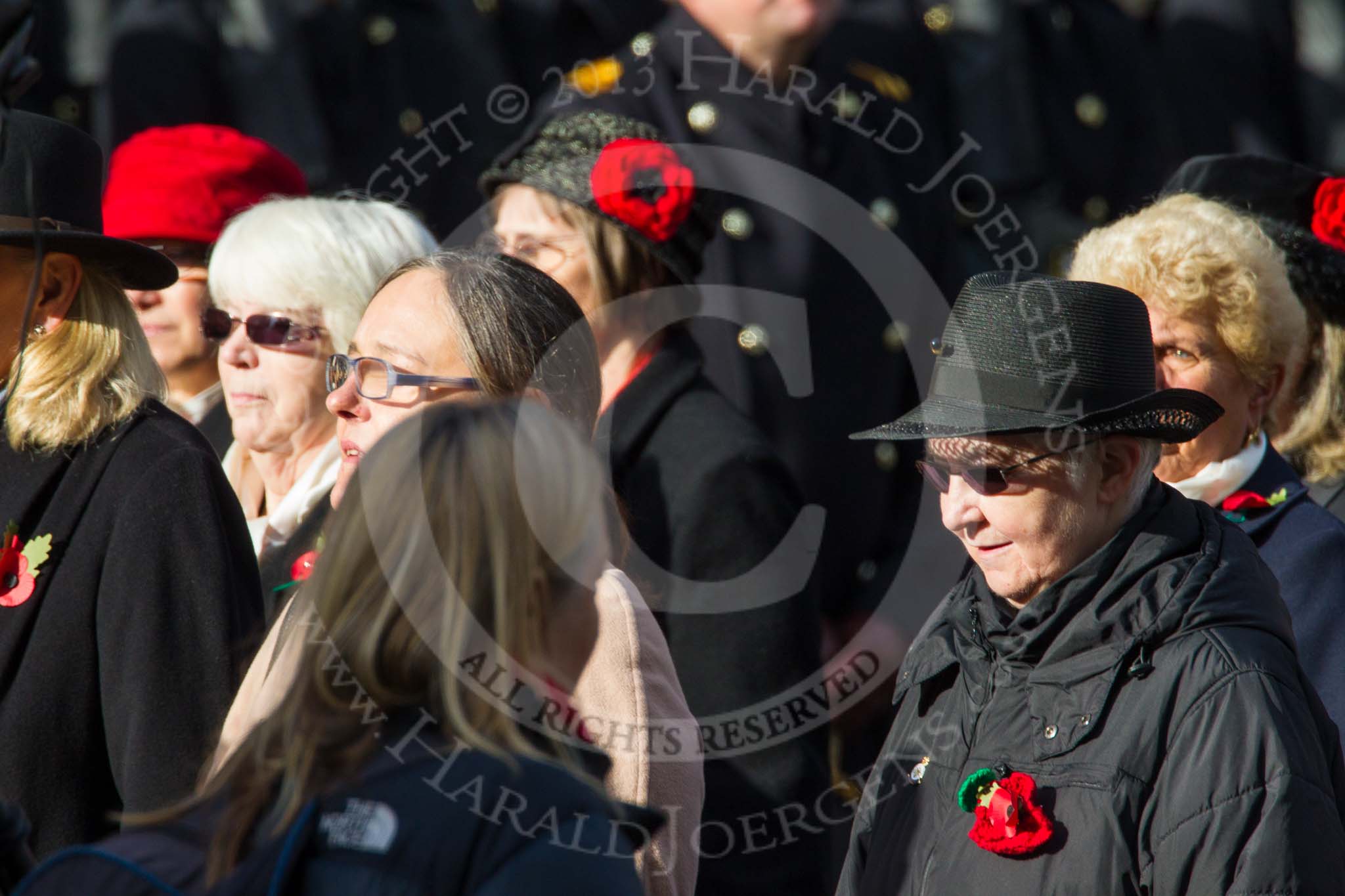 Remembrance Sunday at the Cenotaph in London 2014: Group D24 - War Widows Association.
Press stand opposite the Foreign Office building, Whitehall, London SW1,
London,
Greater London,
United Kingdom,
on 09 November 2014 at 11:47, image #456