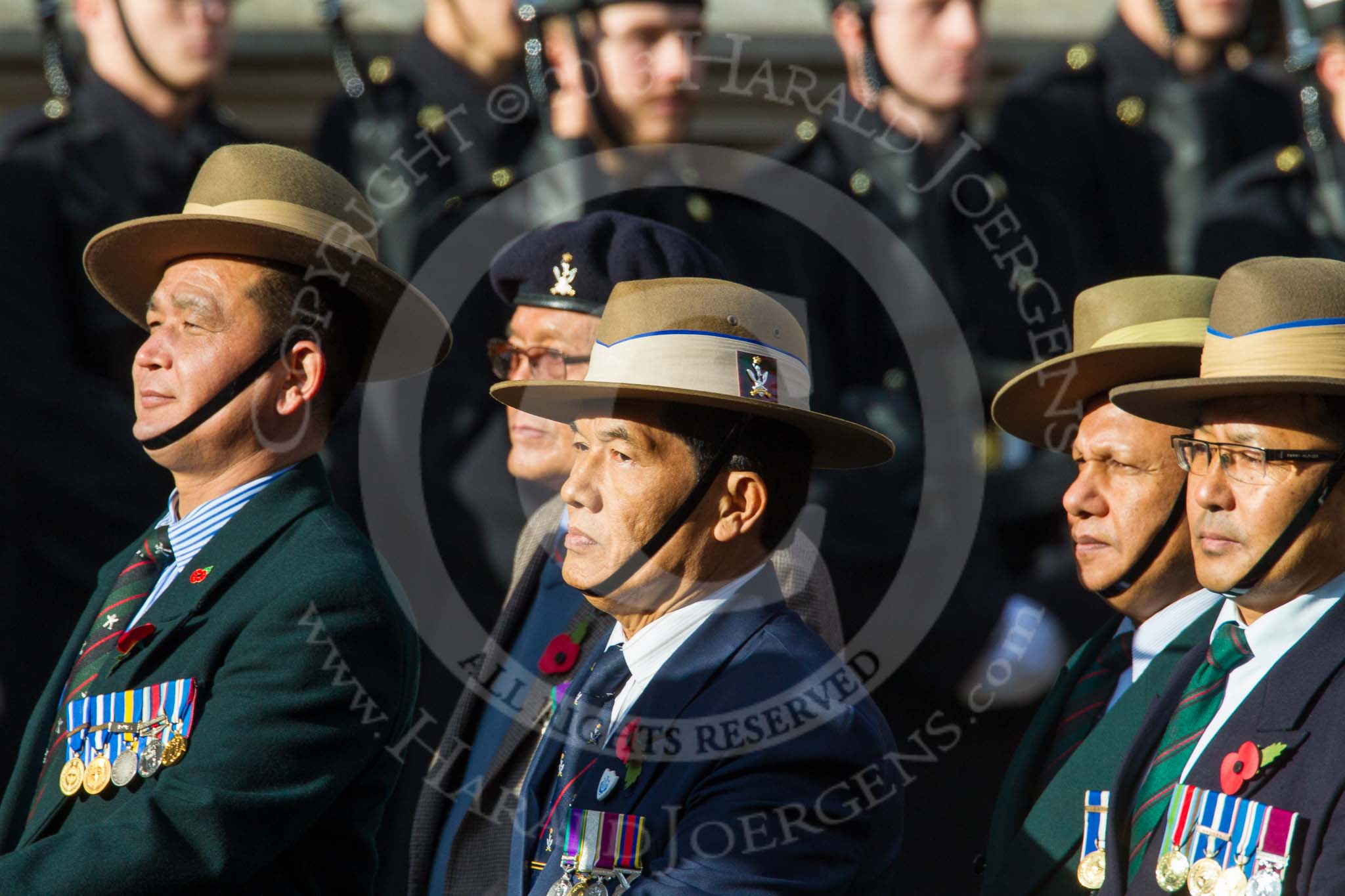 Remembrance Sunday at the Cenotaph in London 2014: Group D25 - Gurkha Brigade Association.
Press stand opposite the Foreign Office building, Whitehall, London SW1,
London,
Greater London,
United Kingdom,
on 09 November 2014 at 11:47, image #463