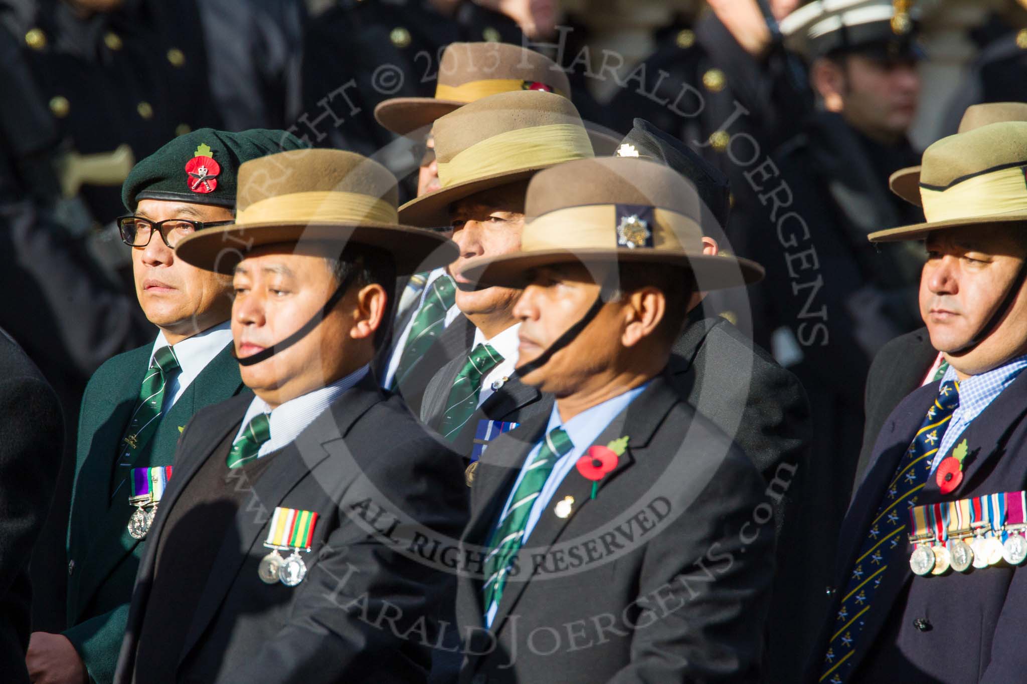 Remembrance Sunday at the Cenotaph in London 2014: Group D26 - British Gurkha Welfare Society.
Press stand opposite the Foreign Office building, Whitehall, London SW1,
London,
Greater London,
United Kingdom,
on 09 November 2014 at 11:47, image #485