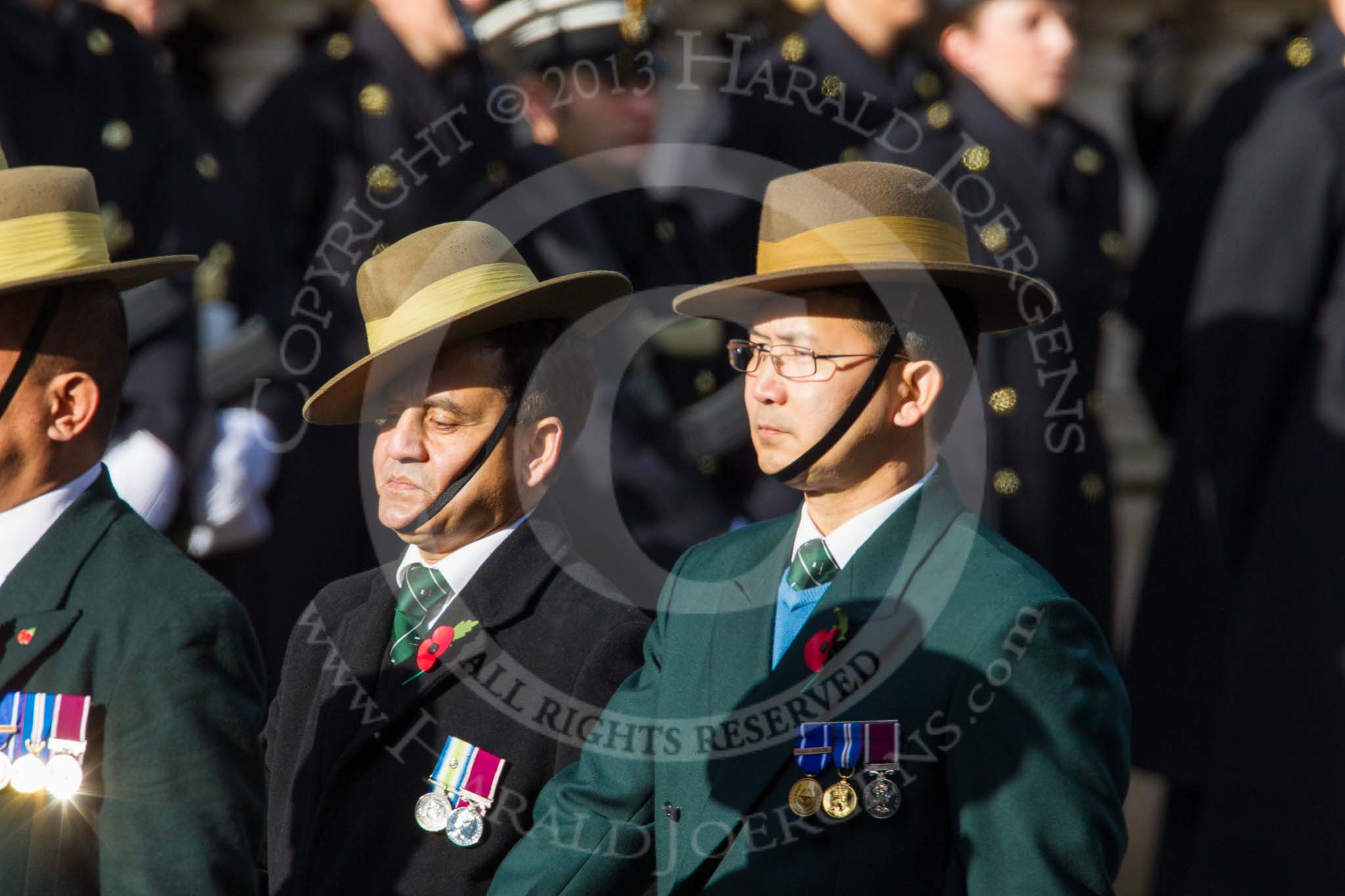 Remembrance Sunday at the Cenotaph in London 2014: Group D26 - British Gurkha Welfare Society.
Press stand opposite the Foreign Office building, Whitehall, London SW1,
London,
Greater London,
United Kingdom,
on 09 November 2014 at 11:47, image #489