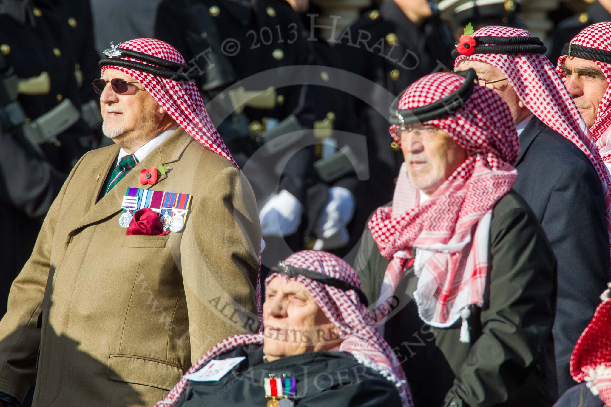 Remembrance Sunday at the Cenotaph in London 2014: Group D28 - Trucial Oman Scouts Association.
Press stand opposite the Foreign Office building, Whitehall, London SW1,
London,
Greater London,
United Kingdom,
on 09 November 2014 at 11:48, image #500