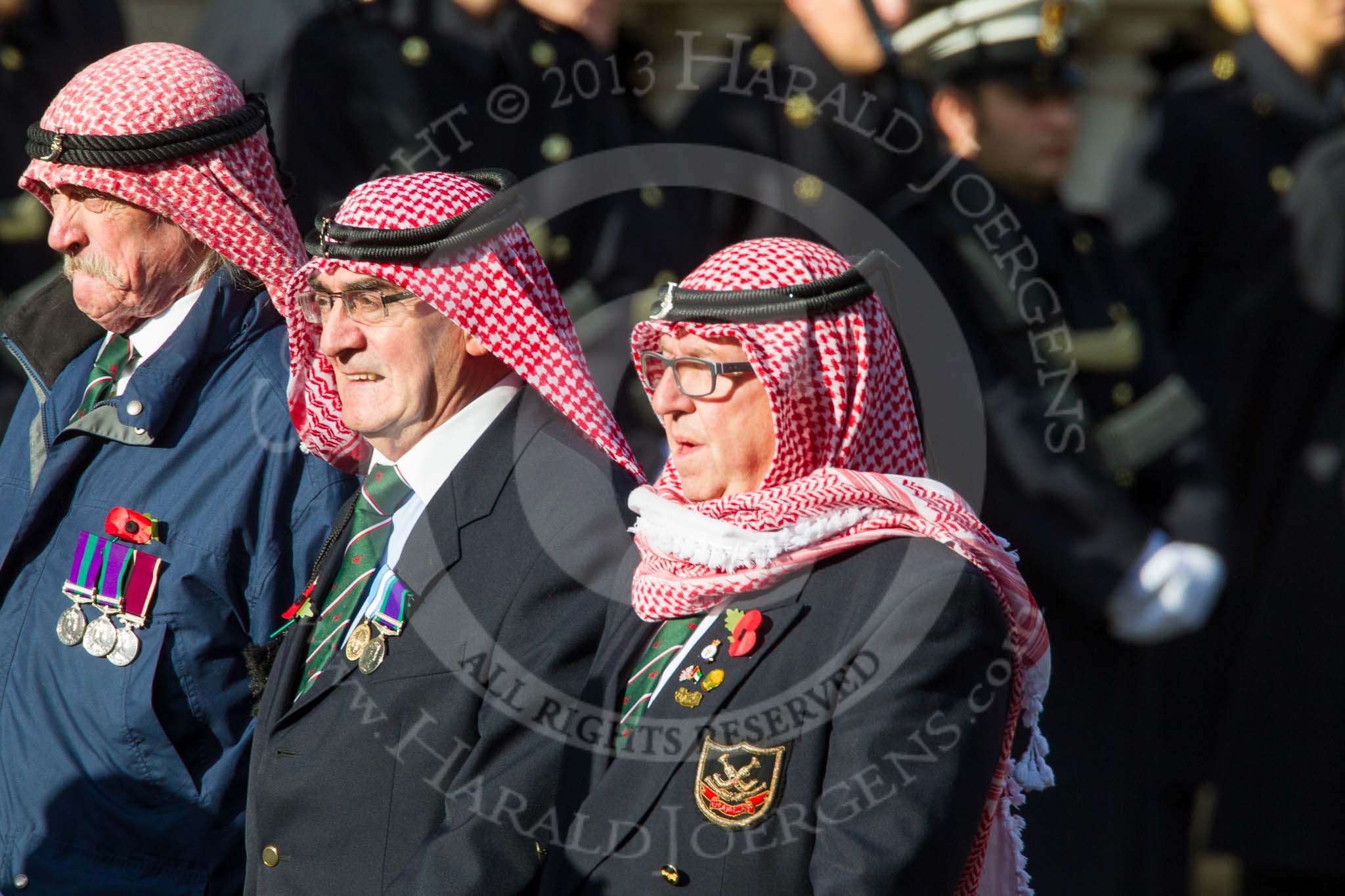 Remembrance Sunday at the Cenotaph in London 2014: Group D28 - Trucial Oman Scouts Association.
Press stand opposite the Foreign Office building, Whitehall, London SW1,
London,
Greater London,
United Kingdom,
on 09 November 2014 at 11:48, image #505