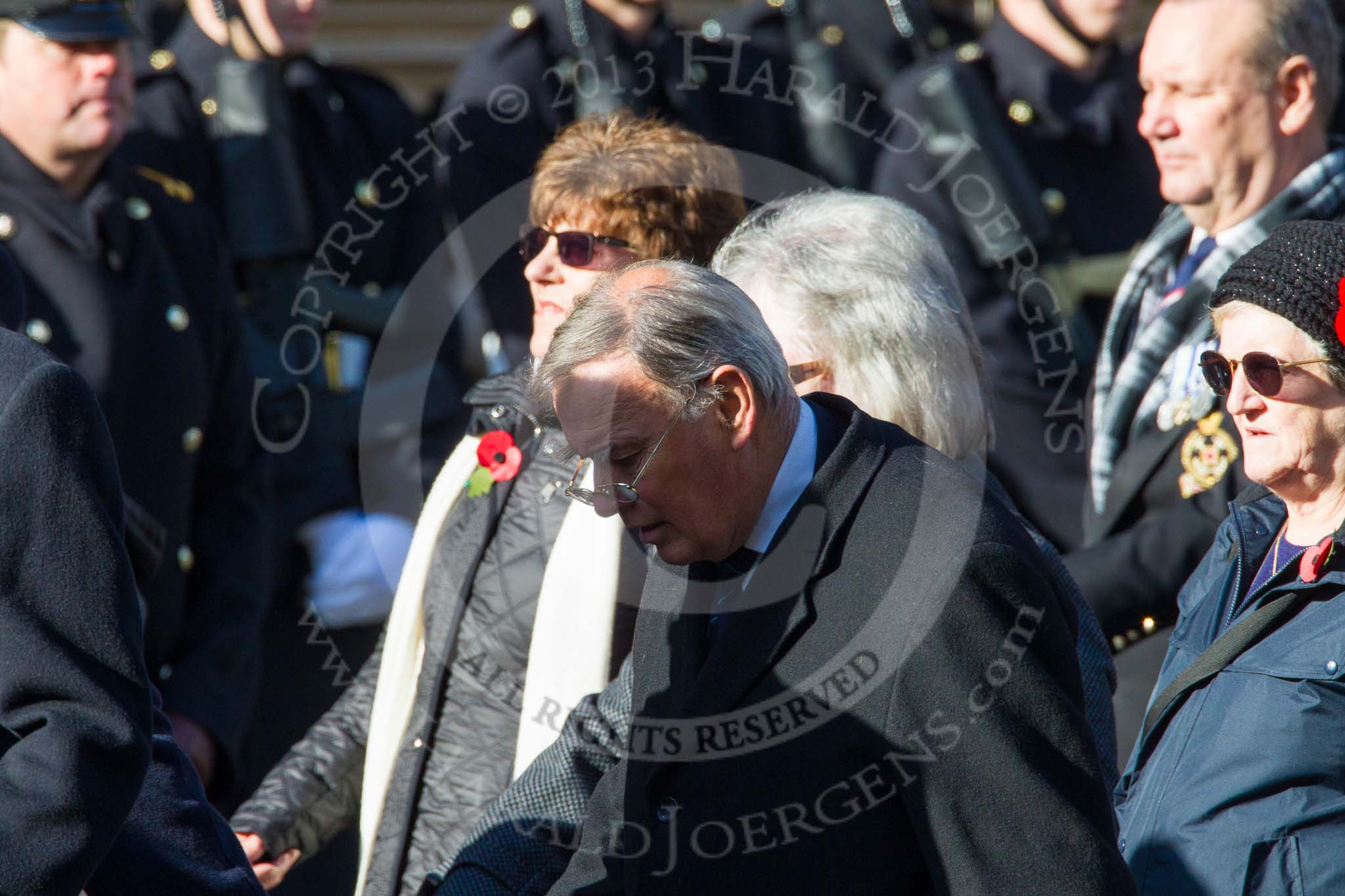 Remembrance Sunday at the Cenotaph in London 2014: Group E27 - Royal Naval Communications Association.
Press stand opposite the Foreign Office building, Whitehall, London SW1,
London,
Greater London,
United Kingdom,
on 09 November 2014 at 11:53, image #793