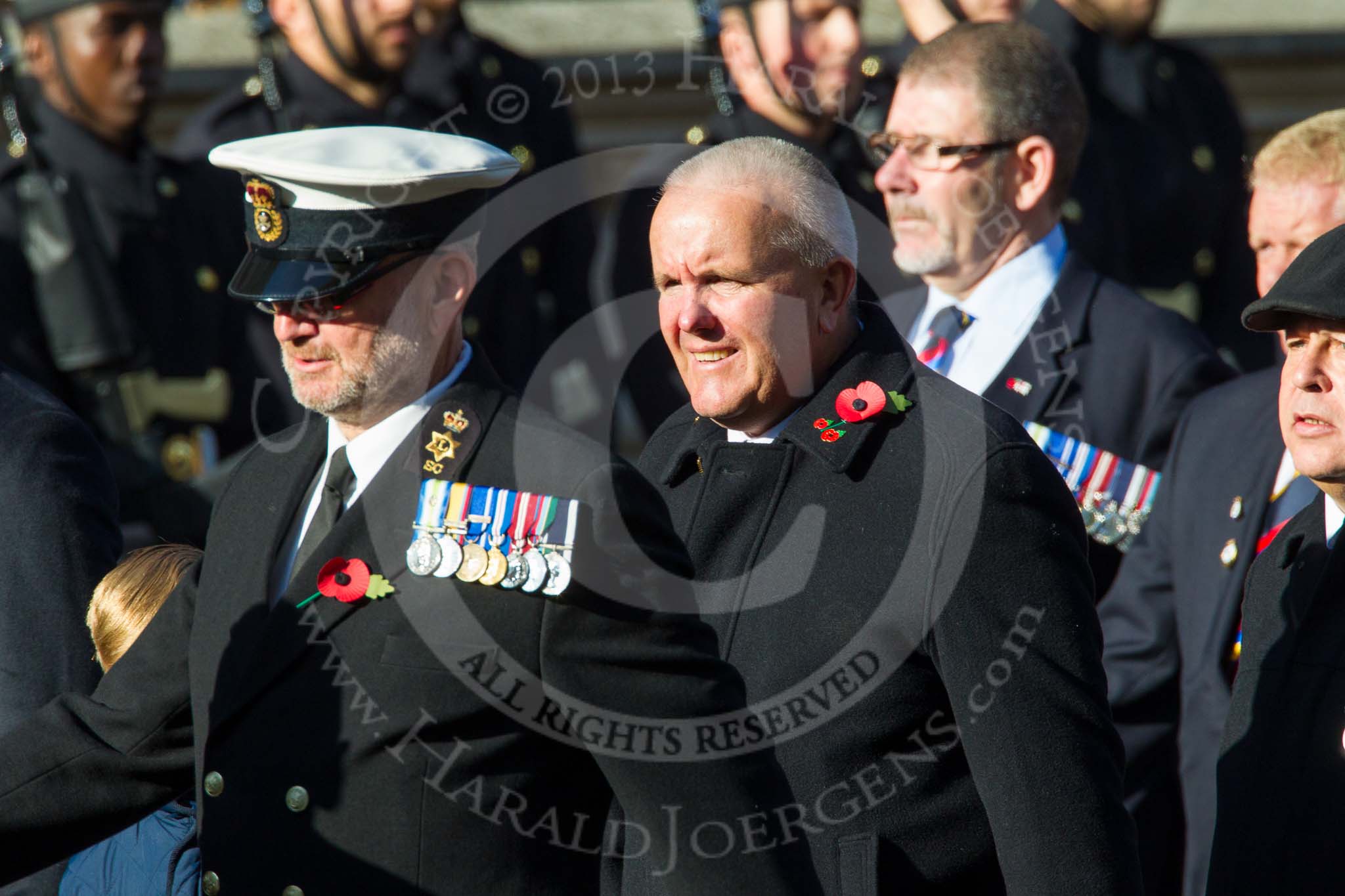 Remembrance Sunday at the Cenotaph in London 2014: Group E37 -Aircraft Handlers Association.
Press stand opposite the Foreign Office building, Whitehall, London SW1,
London,
Greater London,
United Kingdom,
on 09 November 2014 at 11:54, image #847