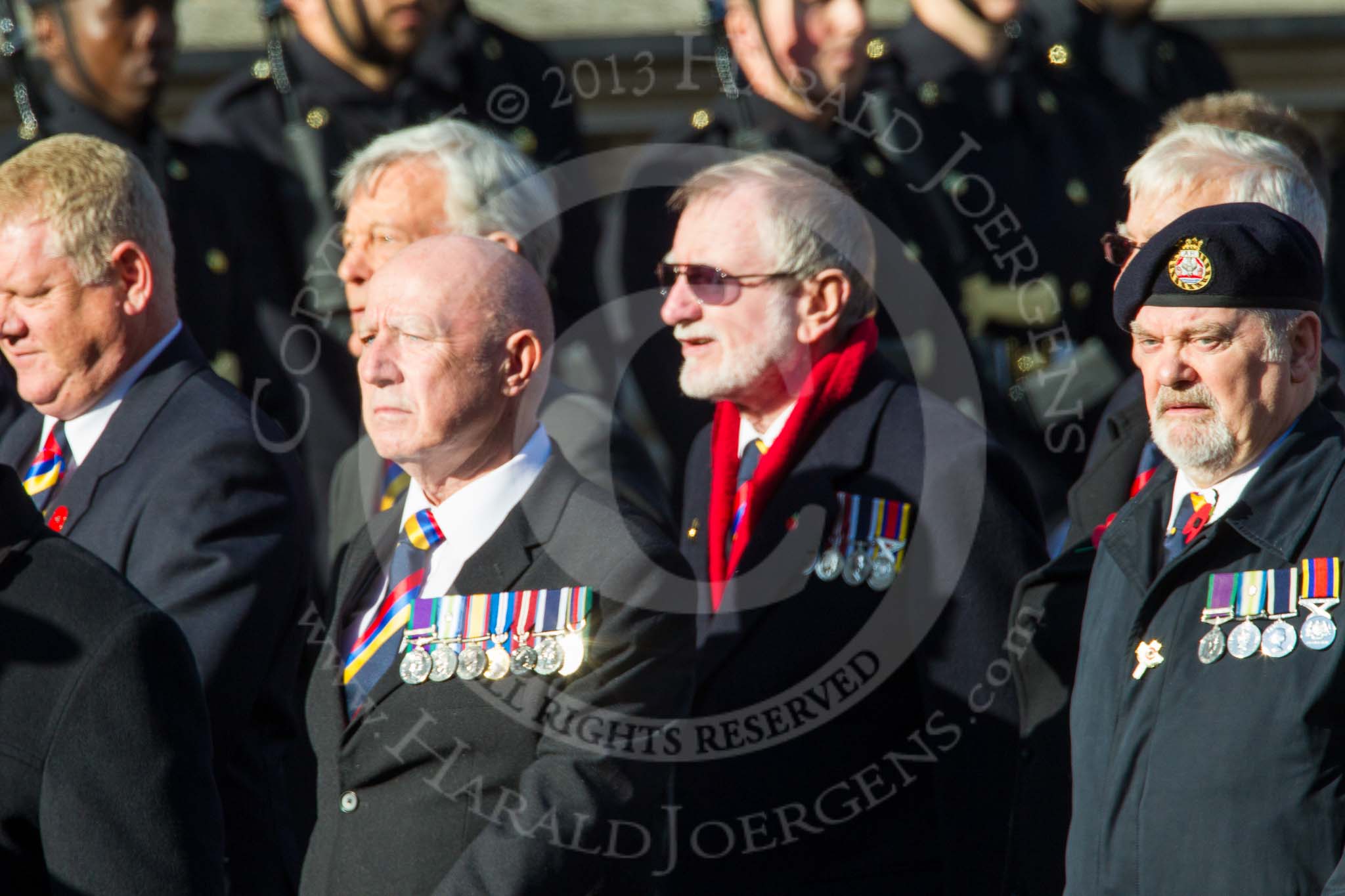 Remembrance Sunday at the Cenotaph in London 2014: Group E37 -Aircraft Handlers Association.
Press stand opposite the Foreign Office building, Whitehall, London SW1,
London,
Greater London,
United Kingdom,
on 09 November 2014 at 11:54, image #849