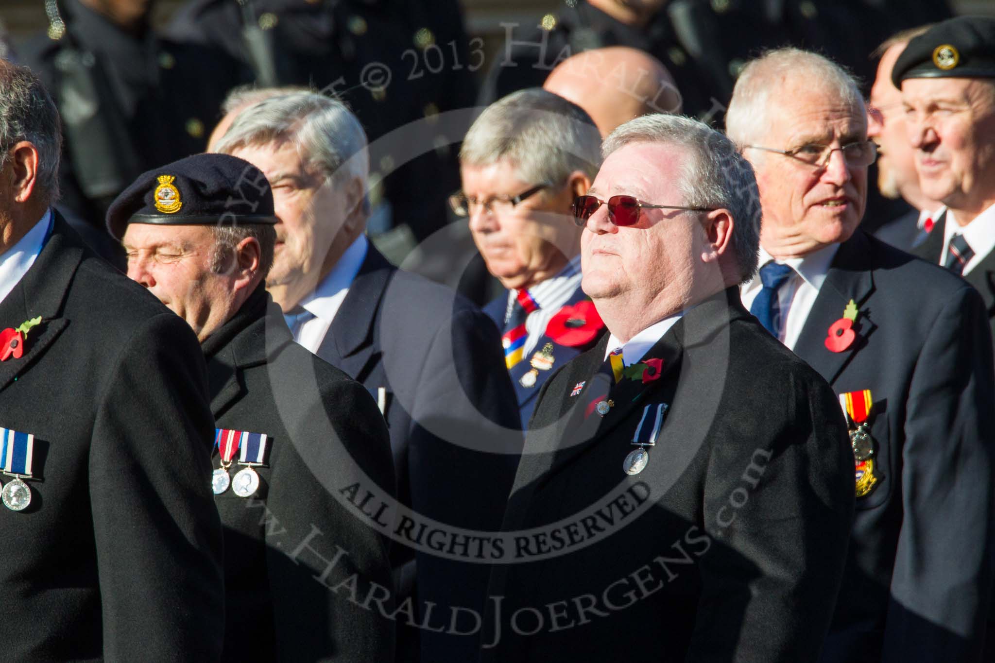 Remembrance Sunday at the Cenotaph in London 2014: Group E37 -Aircraft Handlers Association.
Press stand opposite the Foreign Office building, Whitehall, London SW1,
London,
Greater London,
United Kingdom,
on 09 November 2014 at 11:54, image #852