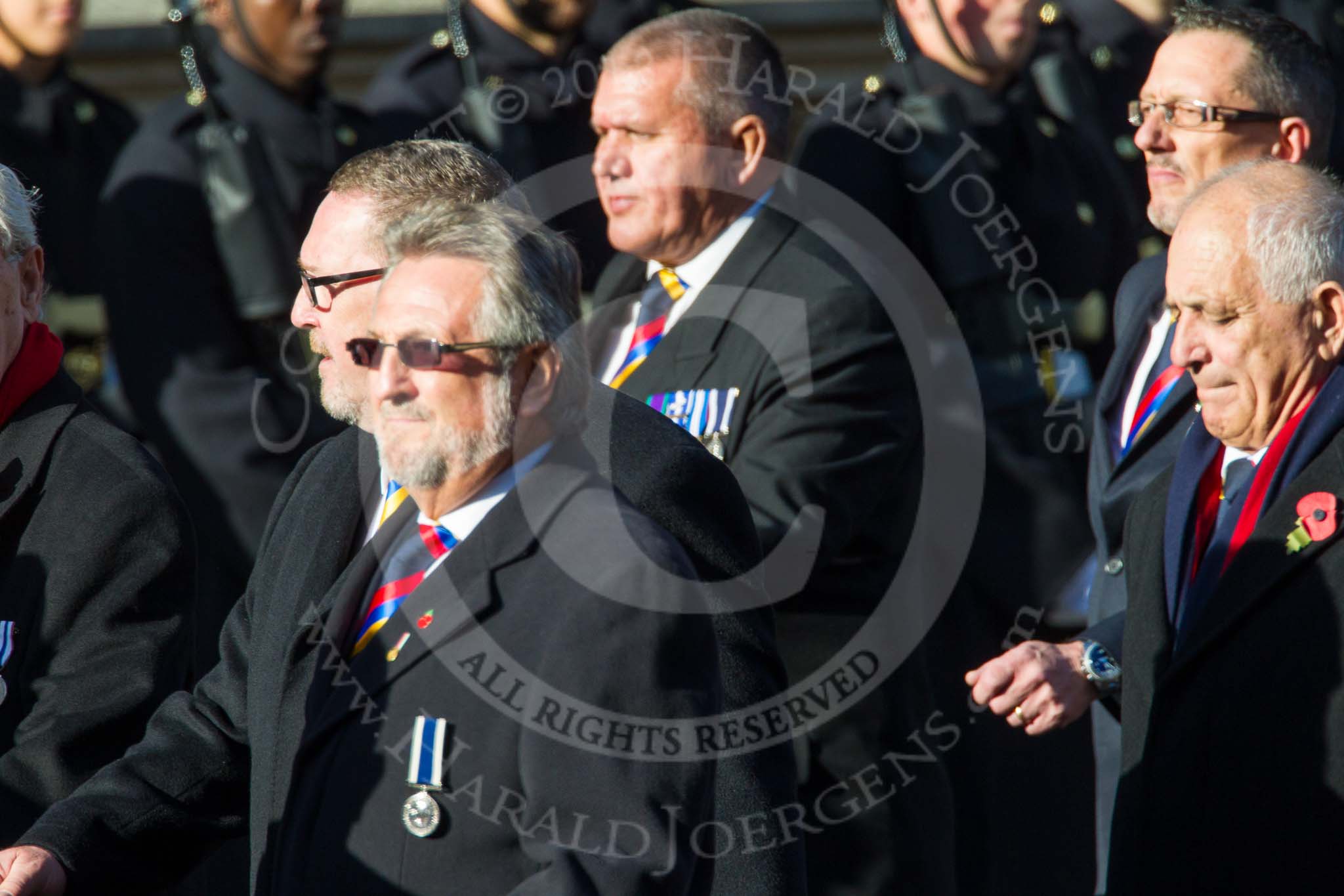 Remembrance Sunday at the Cenotaph in London 2014: Group E37 -Aircraft Handlers Association.
Press stand opposite the Foreign Office building, Whitehall, London SW1,
London,
Greater London,
United Kingdom,
on 09 November 2014 at 11:54, image #856