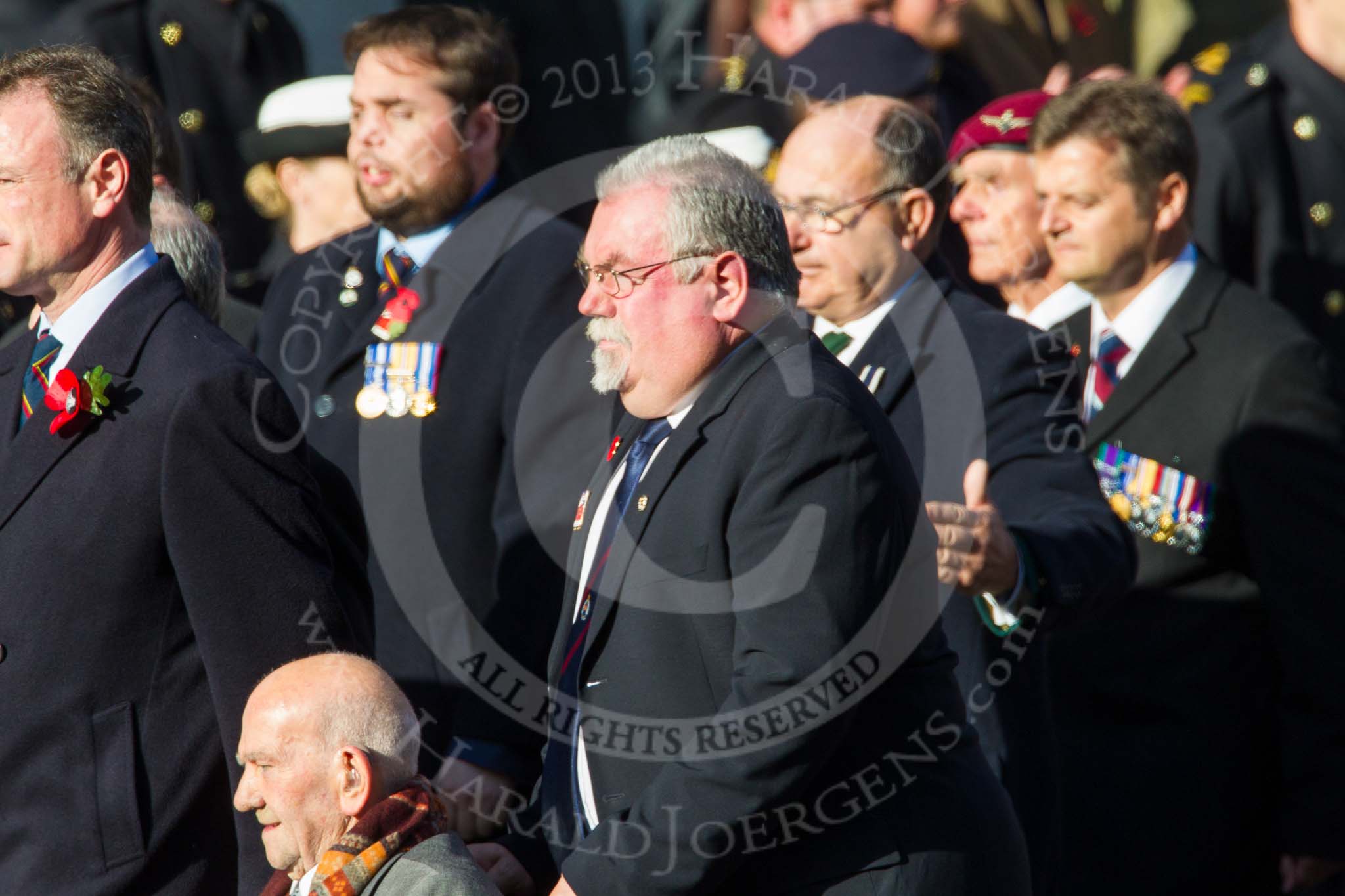 Remembrance Sunday at the Cenotaph in London 2014: ??? Please let me know which group this is! ???.
Press stand opposite the Foreign Office building, Whitehall, London SW1,
London,
Greater London,
United Kingdom,
on 09 November 2014 at 11:55, image #884