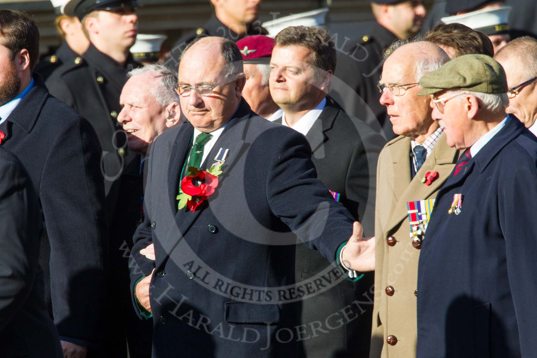 Remembrance Sunday at the Cenotaph in London 2014: ??? Please let me know which group this is! ???.
Press stand opposite the Foreign Office building, Whitehall, London SW1,
London,
Greater London,
United Kingdom,
on 09 November 2014 at 11:55, image #886