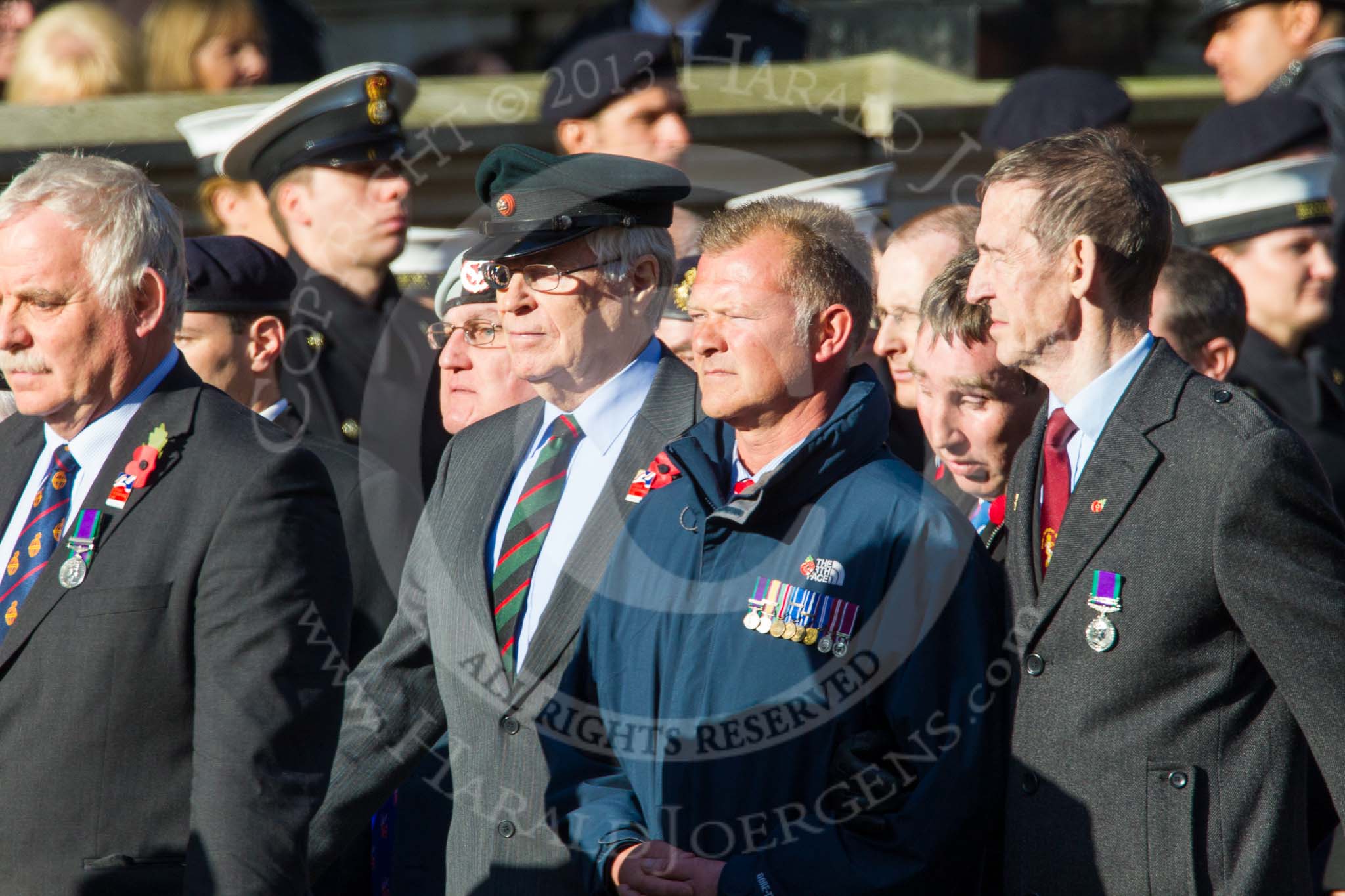 Remembrance Sunday at the Cenotaph in London 2014: ??? Please let me know which group this is! ???.
Press stand opposite the Foreign Office building, Whitehall, London SW1,
London,
Greater London,
United Kingdom,
on 09 November 2014 at 11:55, image #889