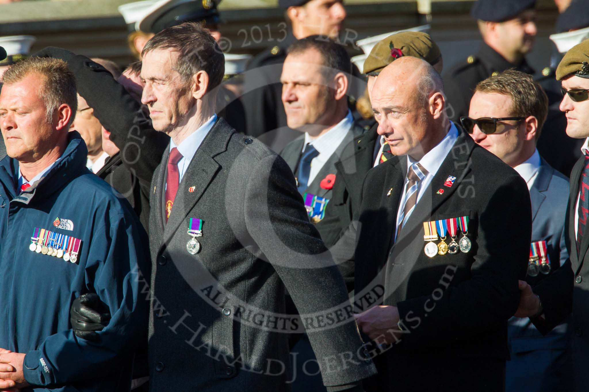 Remembrance Sunday at the Cenotaph in London 2014: ??? Please let me know which group this is! ???.
Press stand opposite the Foreign Office building, Whitehall, London SW1,
London,
Greater London,
United Kingdom,
on 09 November 2014 at 11:55, image #890