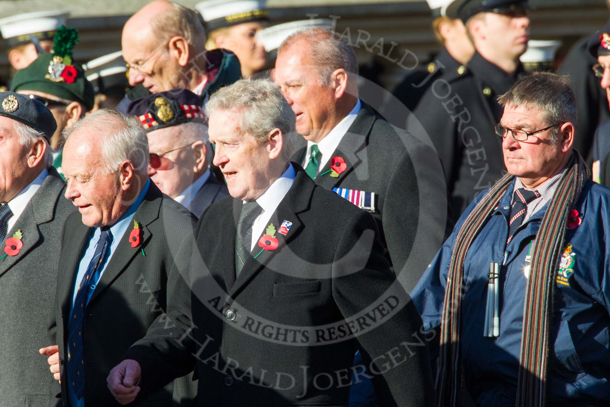 Remembrance Sunday at the Cenotaph in London 2014: ??? Please let me know which group this is! ???.
Press stand opposite the Foreign Office building, Whitehall, London SW1,
London,
Greater London,
United Kingdom,
on 09 November 2014 at 11:55, image #898