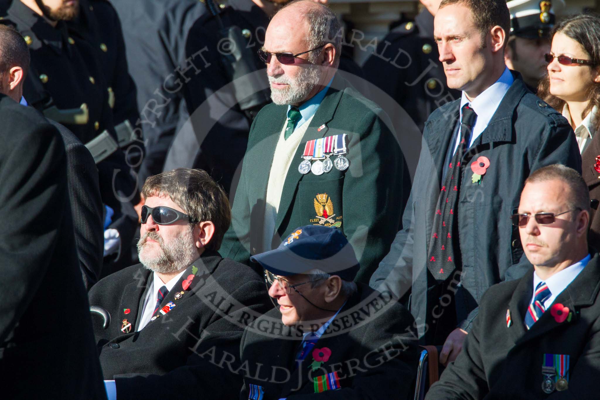 Remembrance Sunday at the Cenotaph in London 2014: Group A1 - Blind Veterans UK.
Press stand opposite the Foreign Office building, Whitehall, London SW1,
London,
Greater London,
United Kingdom,
on 09 November 2014 at 11:56, image #930