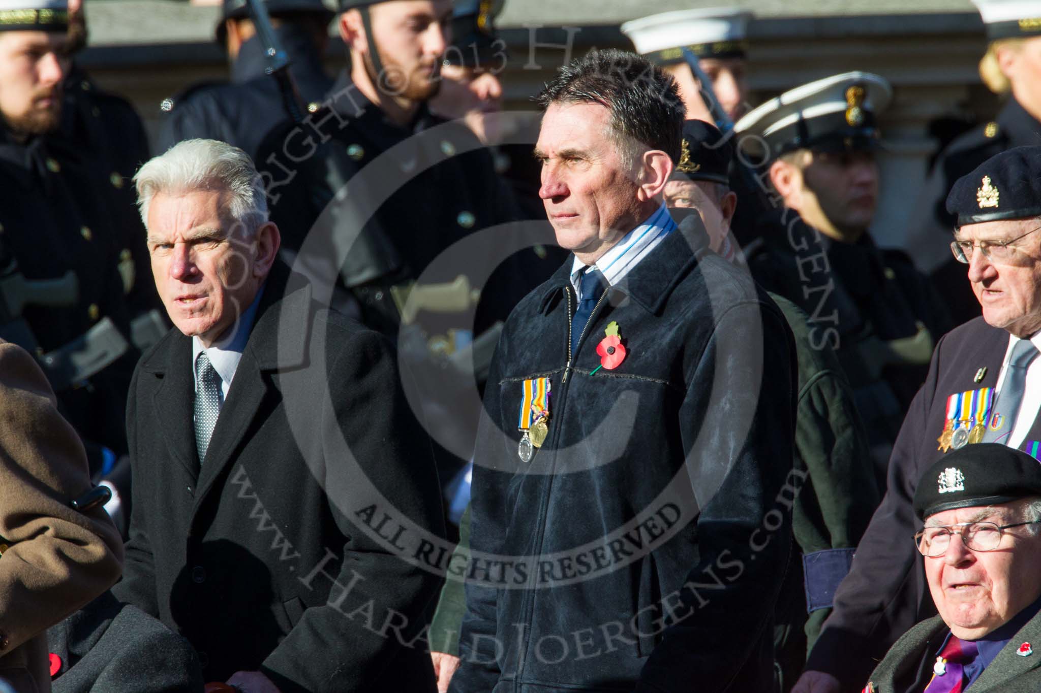 Remembrance Sunday at the Cenotaph in London 2014: Group F12- National Service Veterans Alliance.
Press stand opposite the Foreign Office building, Whitehall, London SW1,
London,
Greater London,
United Kingdom,
on 09 November 2014 at 11:57, image #993