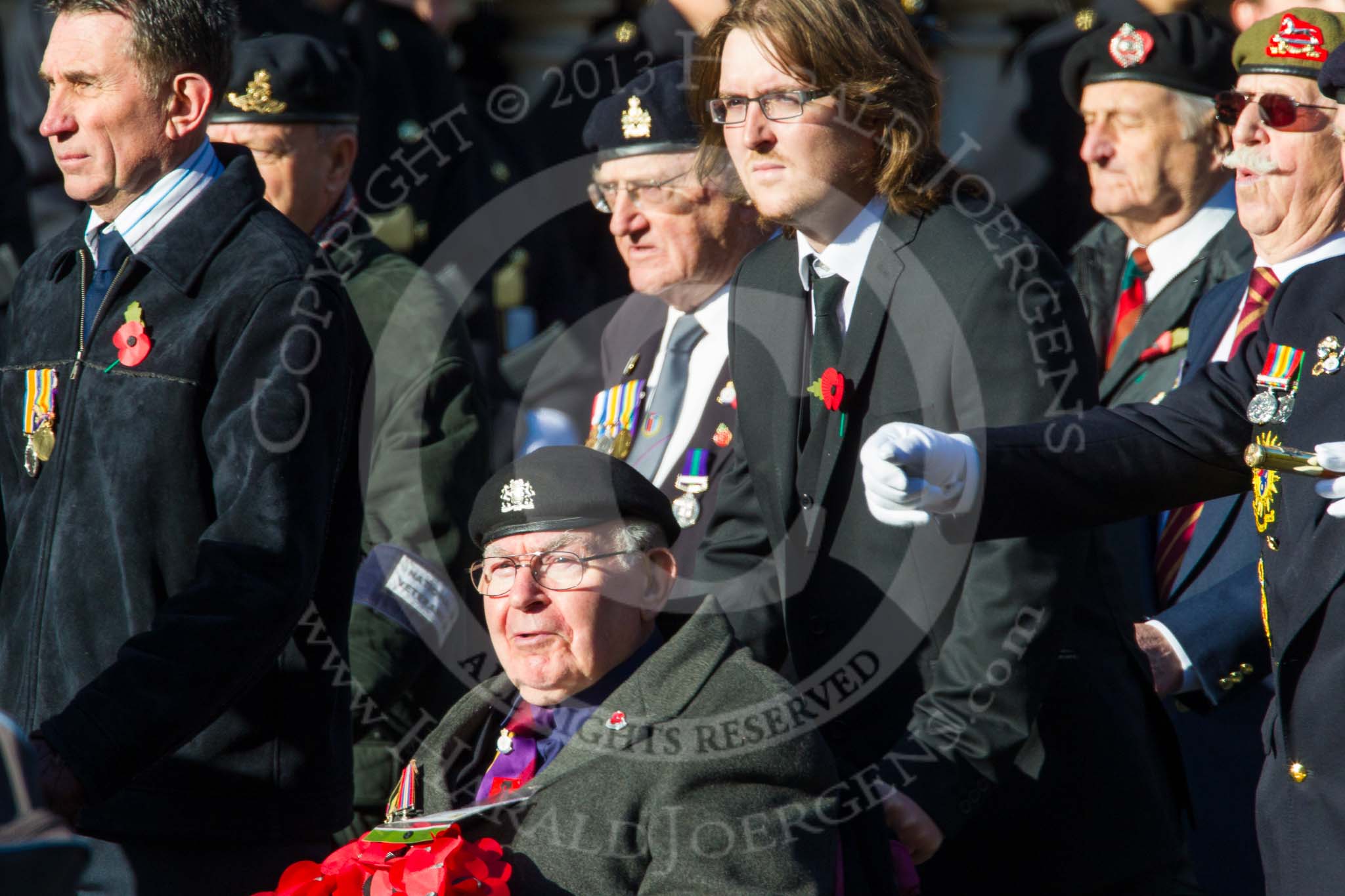 Remembrance Sunday at the Cenotaph in London 2014: Group F12- National Service Veterans Alliance.
Press stand opposite the Foreign Office building, Whitehall, London SW1,
London,
Greater London,
United Kingdom,
on 09 November 2014 at 11:57, image #994