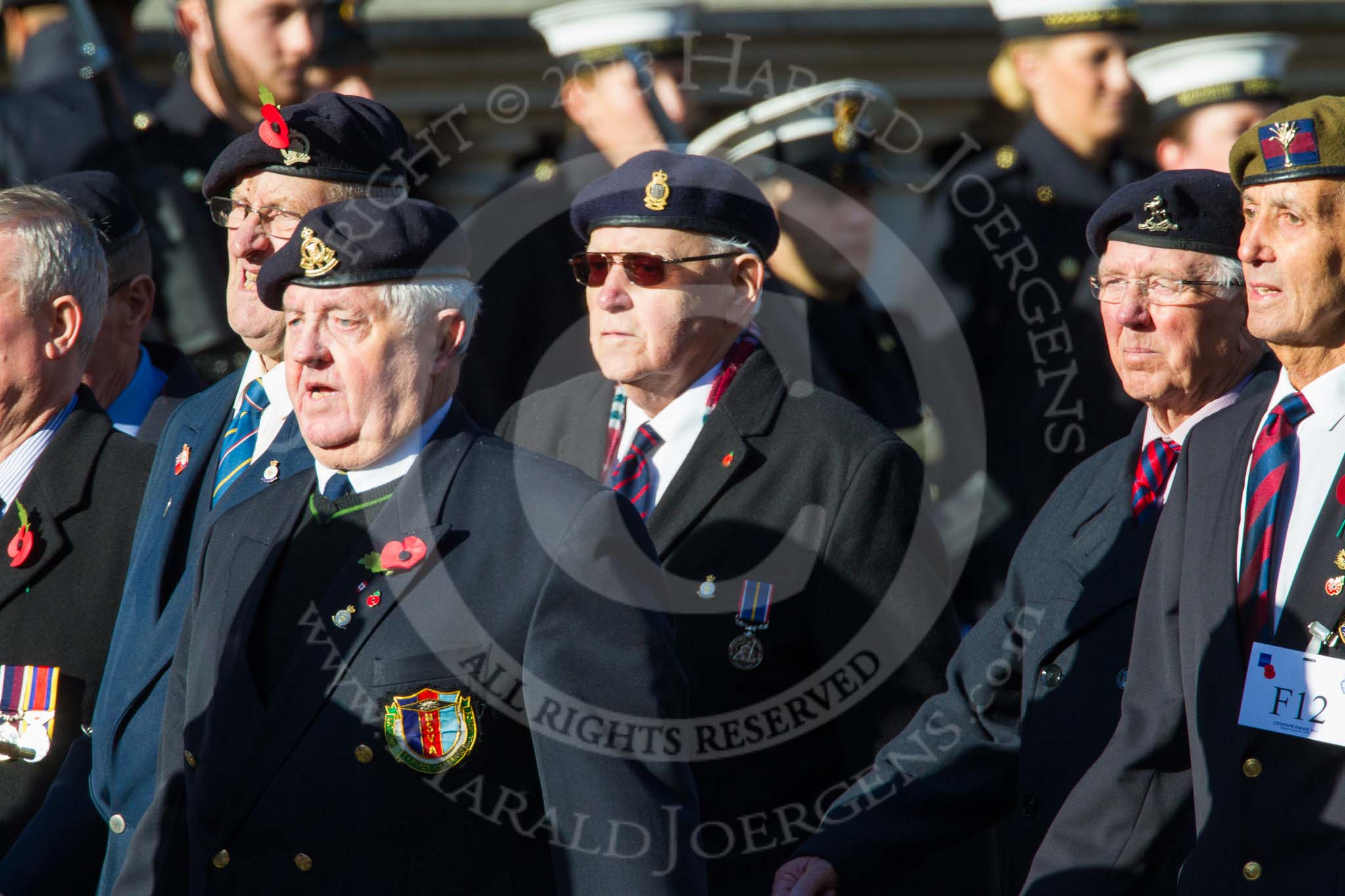 Remembrance Sunday at the Cenotaph in London 2014: Group F12- National Service Veterans Alliance.
Press stand opposite the Foreign Office building, Whitehall, London SW1,
London,
Greater London,
United Kingdom,
on 09 November 2014 at 11:57, image #998