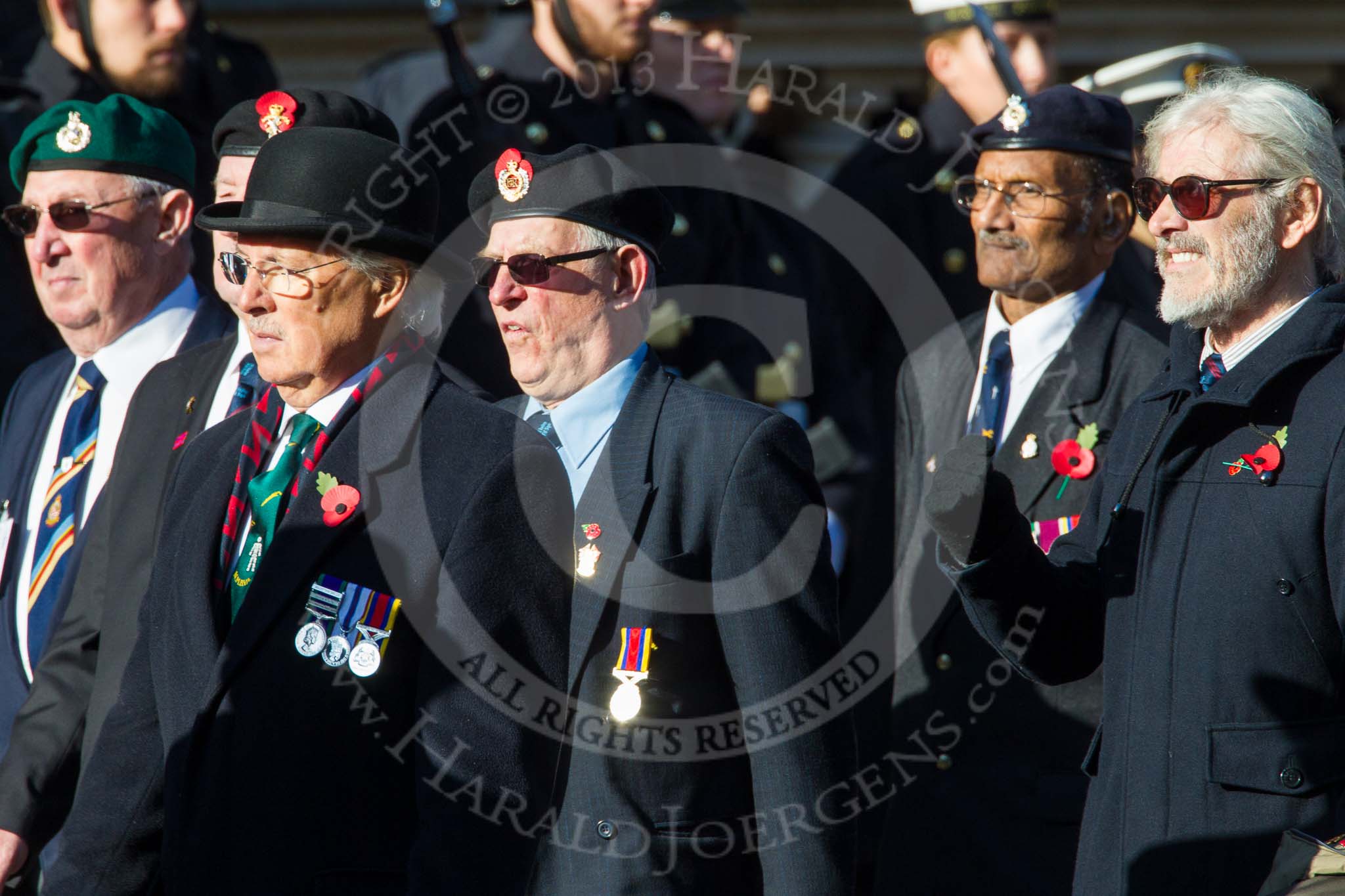 Remembrance Sunday at the Cenotaph in London 2014: Group F14 - National Malaya & Borneo Veterans Association.
Press stand opposite the Foreign Office building, Whitehall, London SW1,
London,
Greater London,
United Kingdom,
on 09 November 2014 at 11:58, image #1020