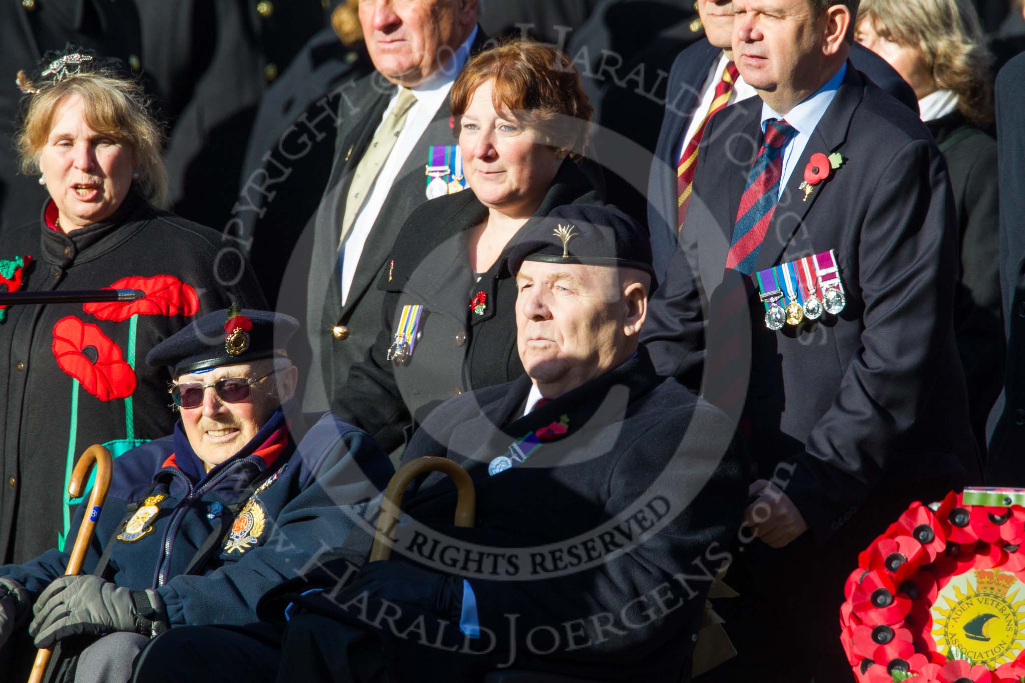 Remembrance Sunday at the Cenotaph in London 2014: Group F18 - Aden Veterans Association.
Press stand opposite the Foreign Office building, Whitehall, London SW1,
London,
Greater London,
United Kingdom,
on 09 November 2014 at 11:59, image #1069