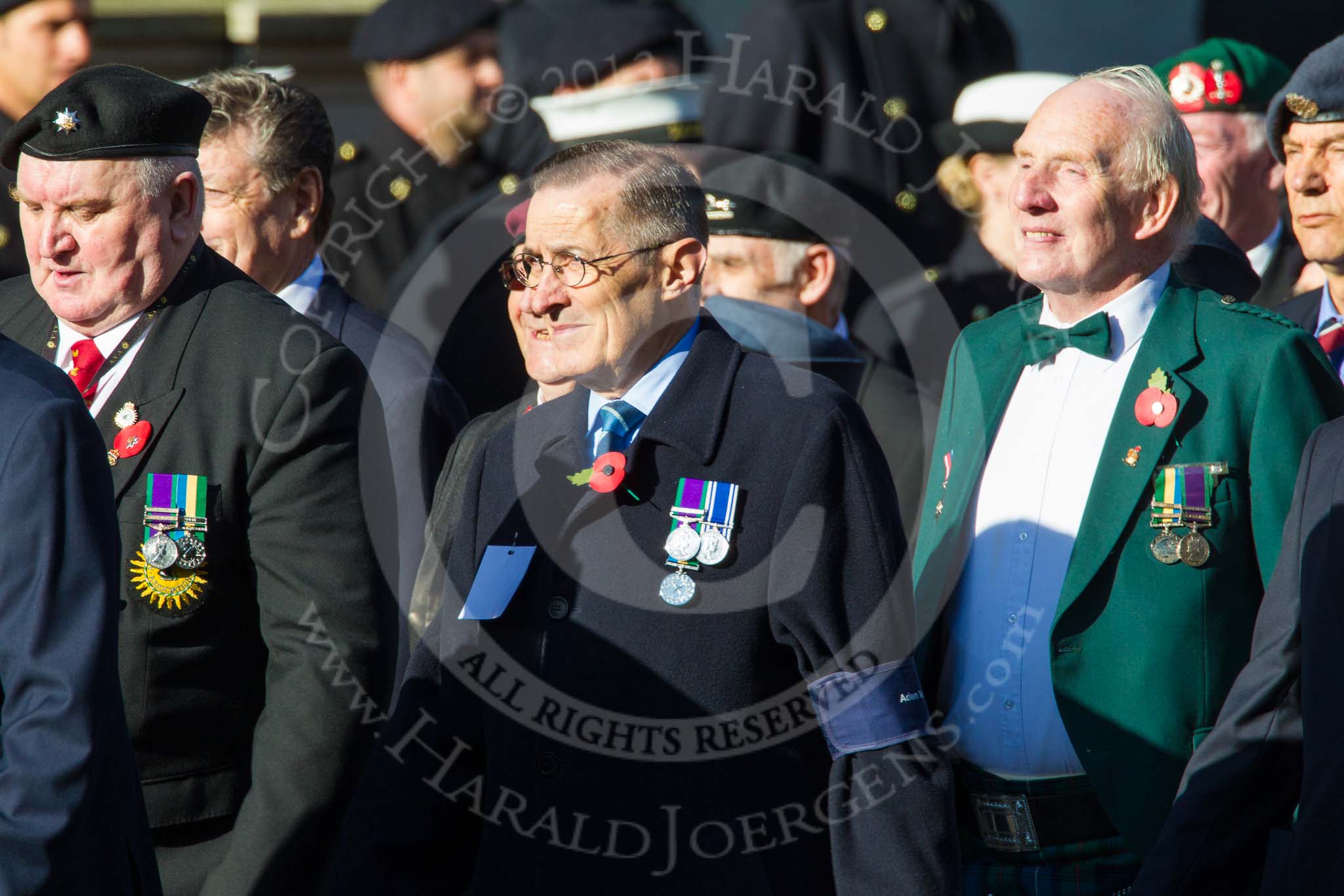 Remembrance Sunday at the Cenotaph in London 2014: Group F18 - Aden Veterans Association.
Press stand opposite the Foreign Office building, Whitehall, London SW1,
London,
Greater London,
United Kingdom,
on 09 November 2014 at 11:59, image #1073