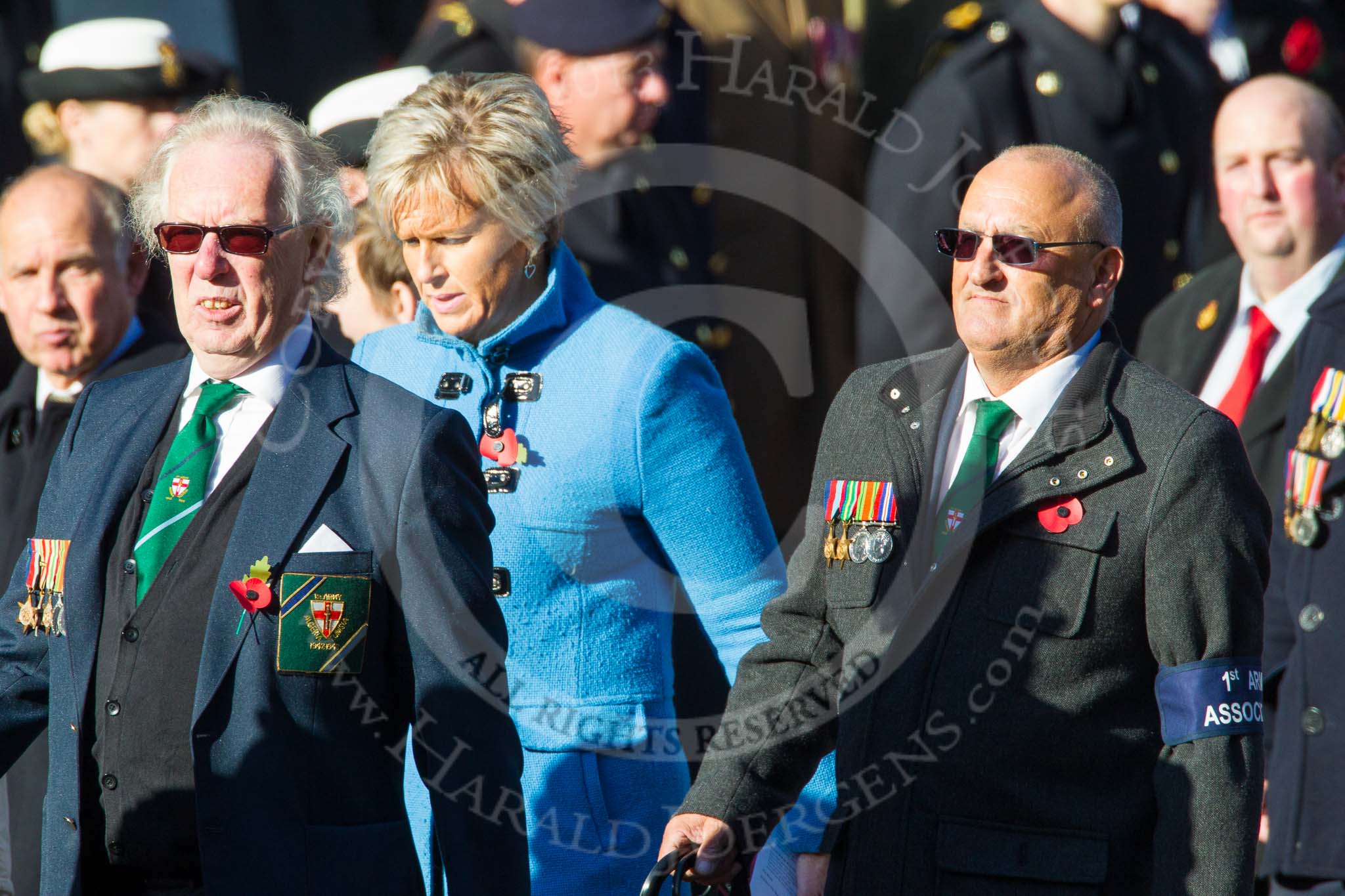 Remembrance Sunday at the Cenotaph in London 2014: Group F19 - 1st Army Association.
Press stand opposite the Foreign Office building, Whitehall, London SW1,
London,
Greater London,
United Kingdom,
on 09 November 2014 at 11:59, image #1093