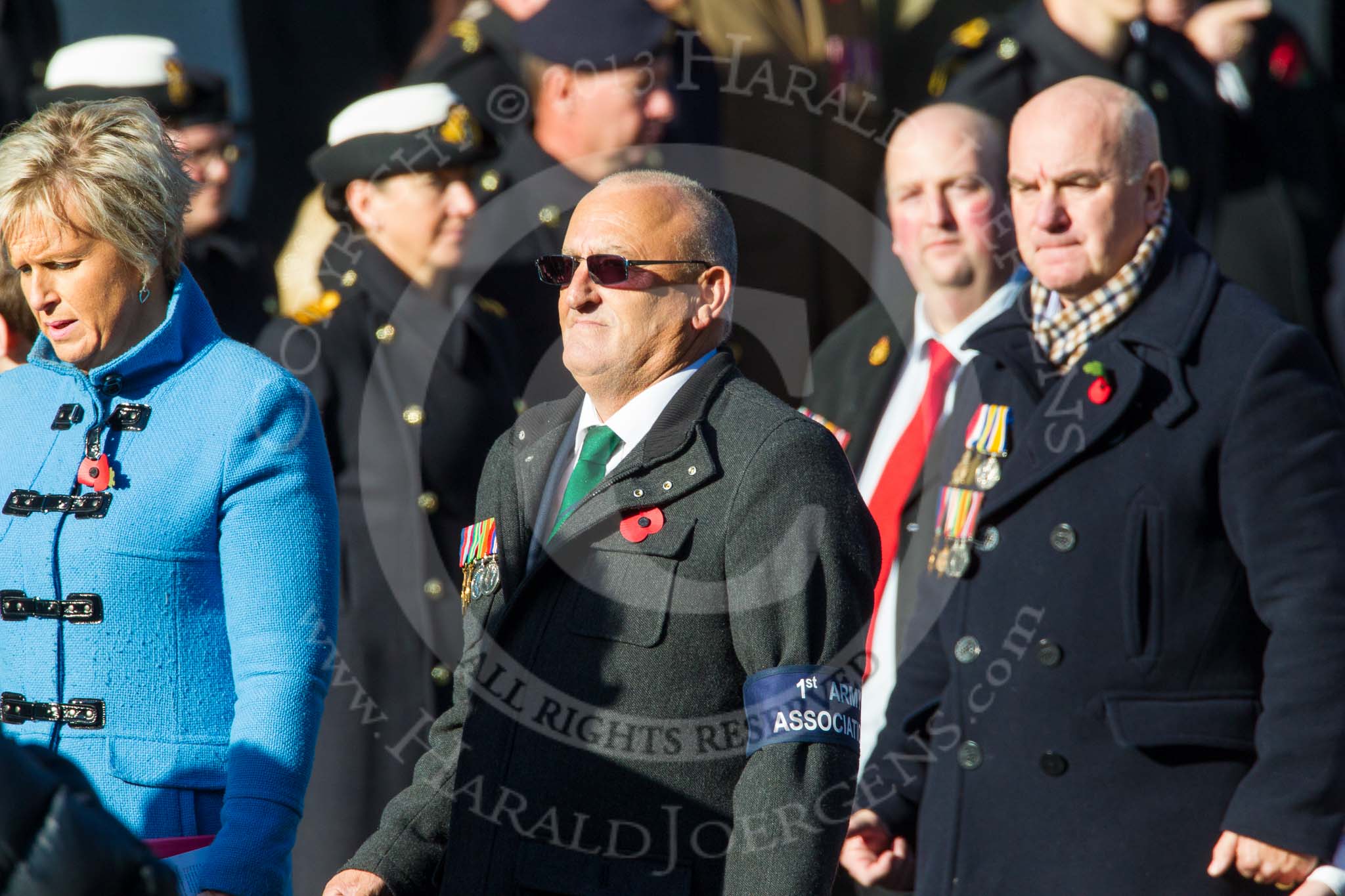 Remembrance Sunday at the Cenotaph in London 2014: Group F19 - 1st Army Association.
Press stand opposite the Foreign Office building, Whitehall, London SW1,
London,
Greater London,
United Kingdom,
on 09 November 2014 at 11:59, image #1094