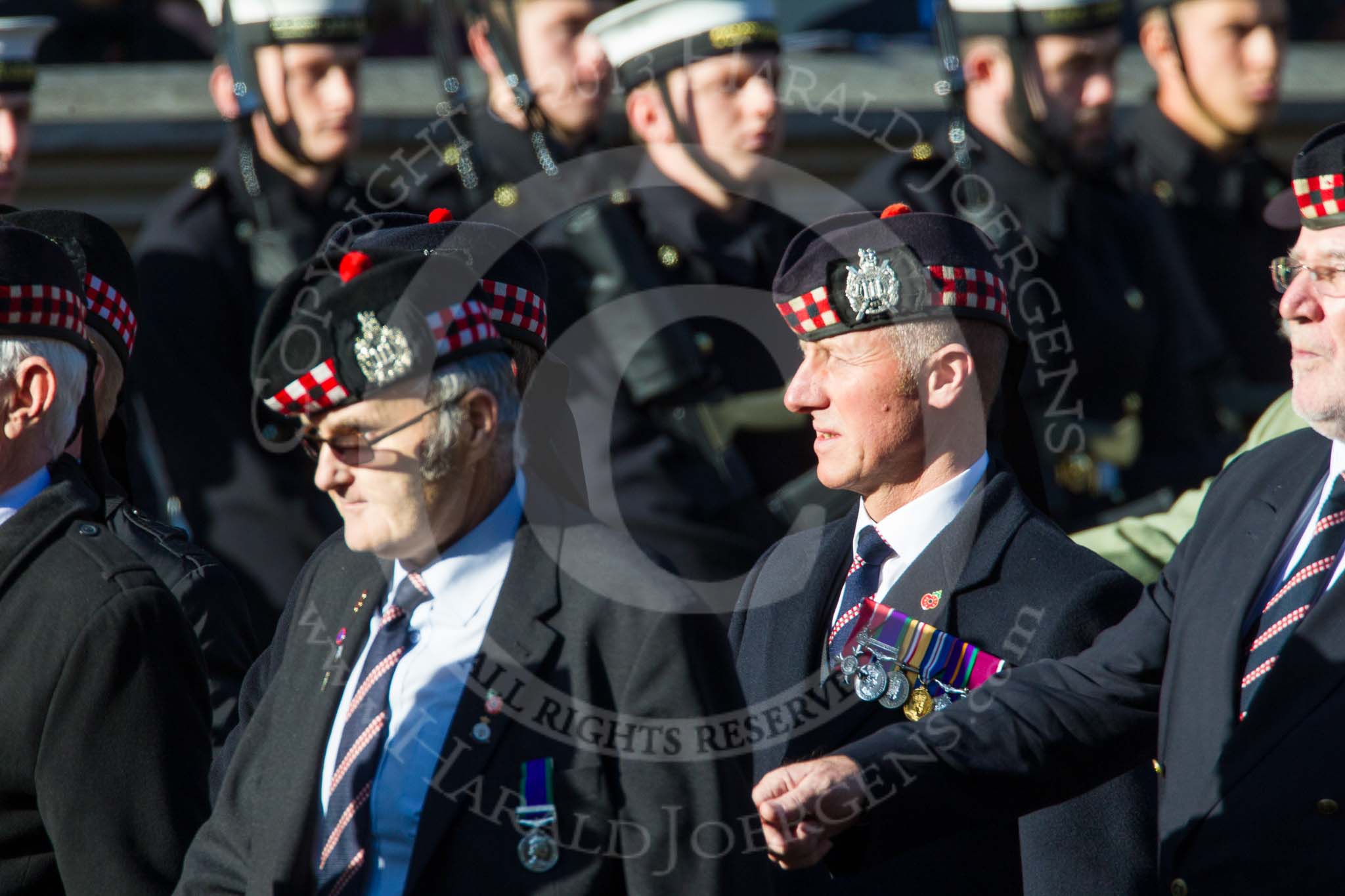 Remembrance Sunday at the Cenotaph in London 2014: Group A12 - King's Own Scottish Borderers.
Press stand opposite the Foreign Office building, Whitehall, London SW1,
London,
Greater London,
United Kingdom,
on 09 November 2014 at 12:02, image #1267
