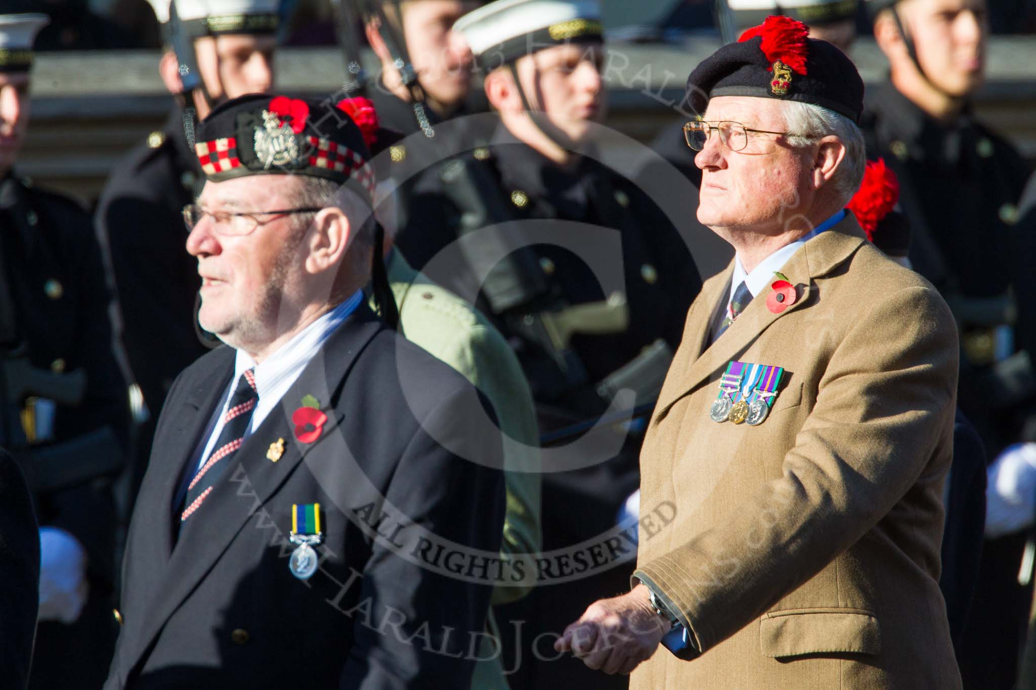 Remembrance Sunday at the Cenotaph in London 2014: Group A12 - King's Own Scottish Borderers.
Press stand opposite the Foreign Office building, Whitehall, London SW1,
London,
Greater London,
United Kingdom,
on 09 November 2014 at 12:02, image #1269