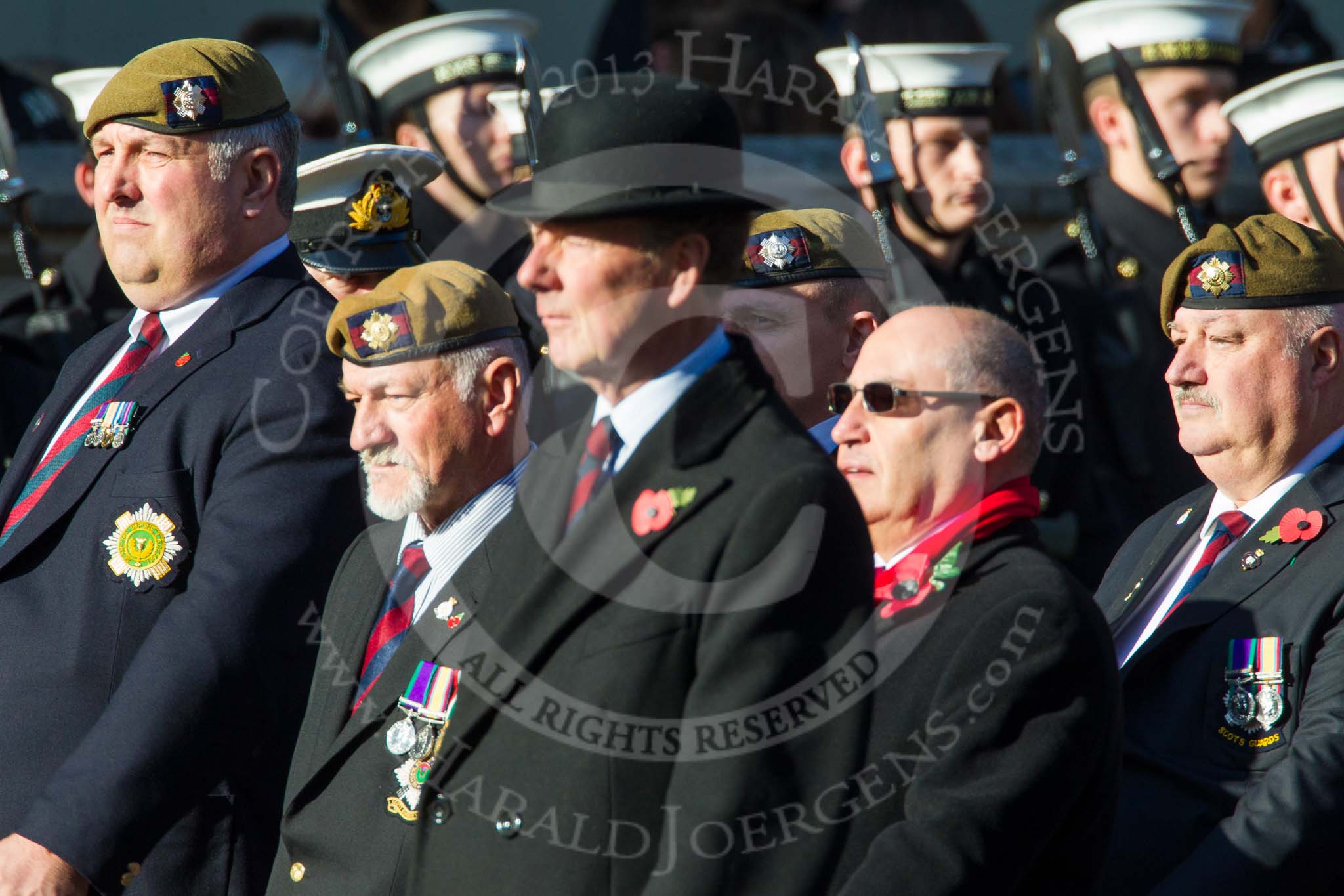 Remembrance Sunday at the Cenotaph in London 2014: Group A19 - Scots Guards Association.
Press stand opposite the Foreign Office building, Whitehall, London SW1,
London,
Greater London,
United Kingdom,
on 09 November 2014 at 12:03, image #1324