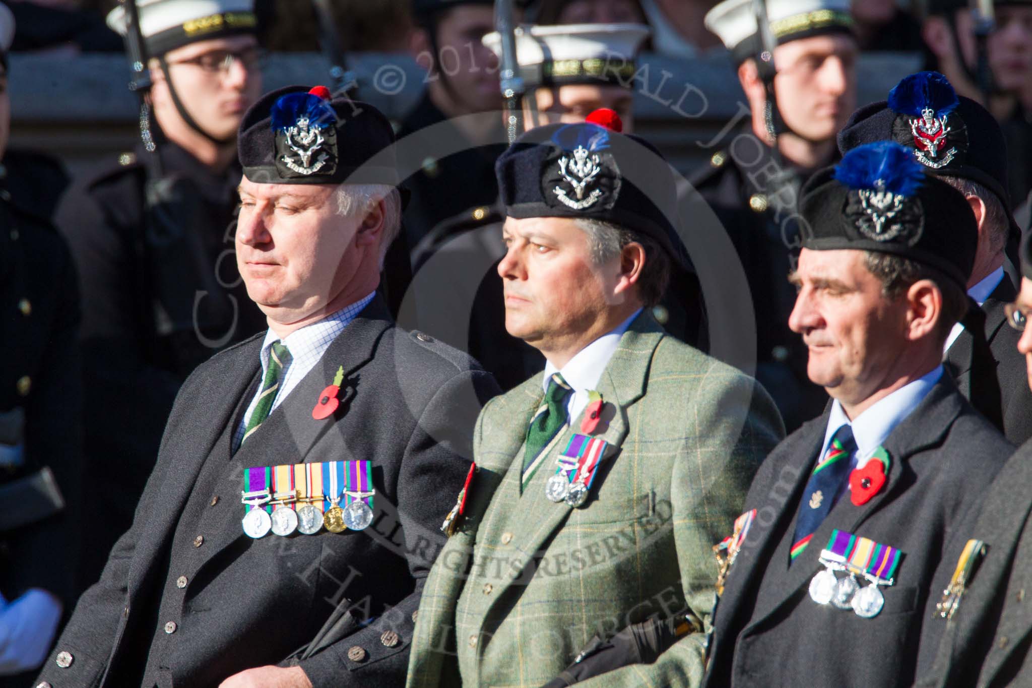 Remembrance Sunday at the Cenotaph in London 2014: Group A35 - Queen's Own Highlanders Regimental Association.
Press stand opposite the Foreign Office building, Whitehall, London SW1,
London,
Greater London,
United Kingdom,
on 09 November 2014 at 12:06, image #1451