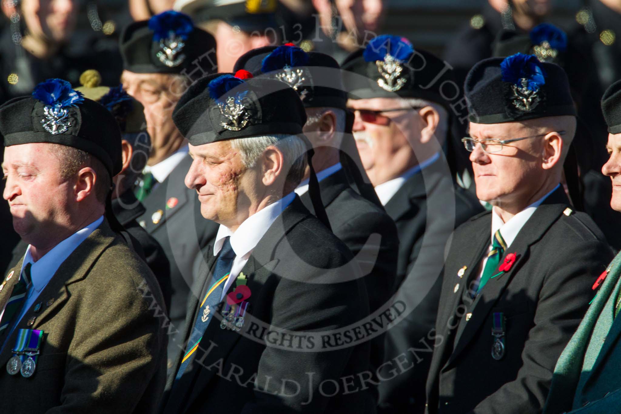 Remembrance Sunday at the Cenotaph in London 2014: Group A35 - Queen's Own Highlanders Regimental Association.
Press stand opposite the Foreign Office building, Whitehall, London SW1,
London,
Greater London,
United Kingdom,
on 09 November 2014 at 12:06, image #1458