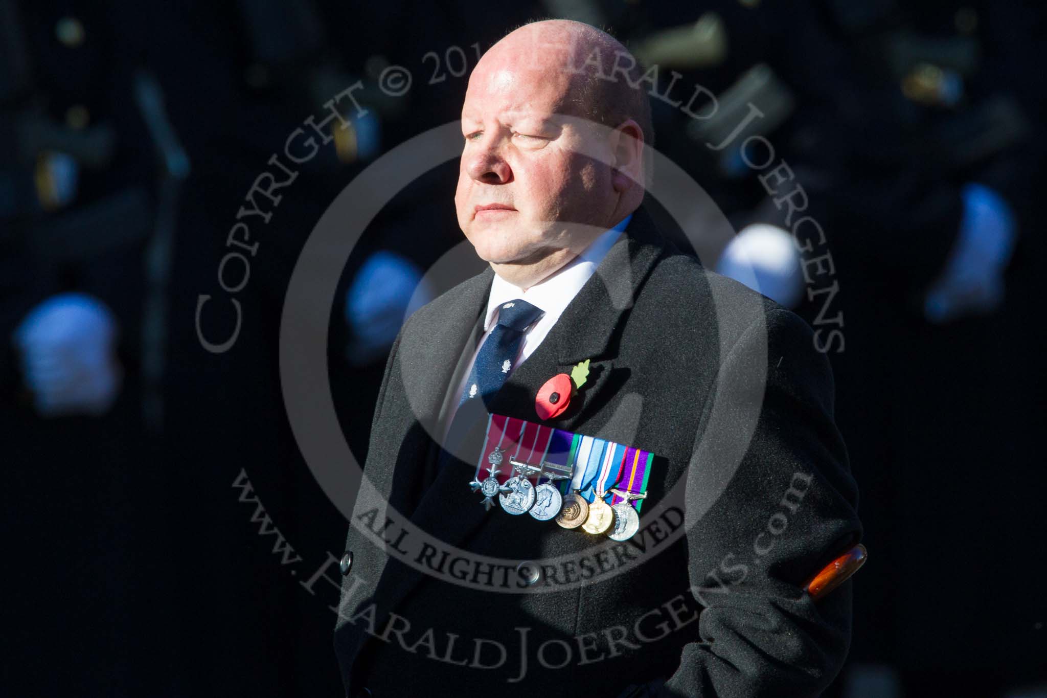 Remembrance Sunday at the Cenotaph in London 2014: Group B16 - Royal Pioneer Corps Association.
Press stand opposite the Foreign Office building, Whitehall, London SW1,
London,
Greater London,
United Kingdom,
on 09 November 2014 at 12:09, image #1671