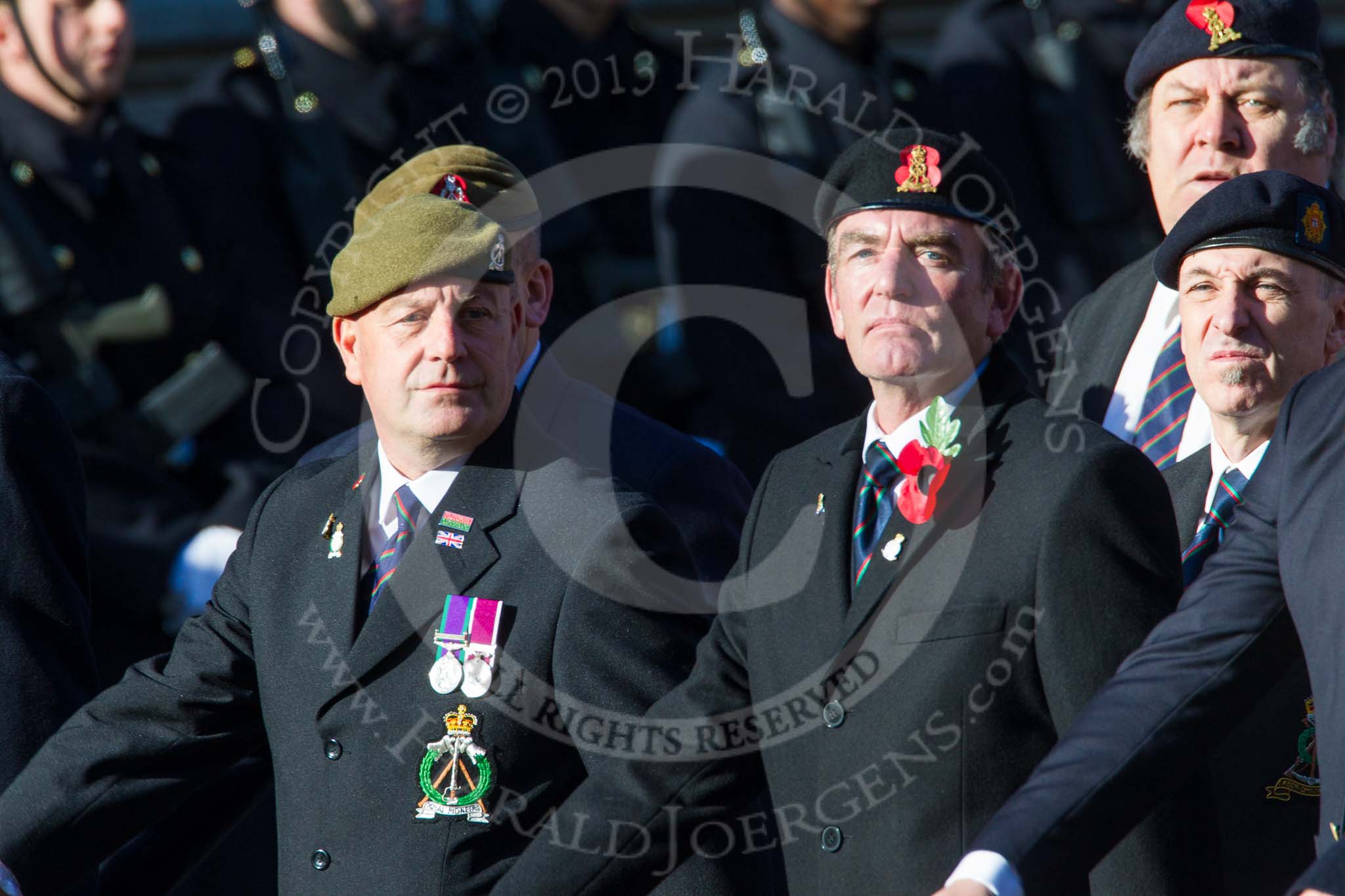 Remembrance Sunday at the Cenotaph in London 2014: Group B16 - Royal Pioneer Corps Association.
Press stand opposite the Foreign Office building, Whitehall, London SW1,
London,
Greater London,
United Kingdom,
on 09 November 2014 at 12:09, image #1676