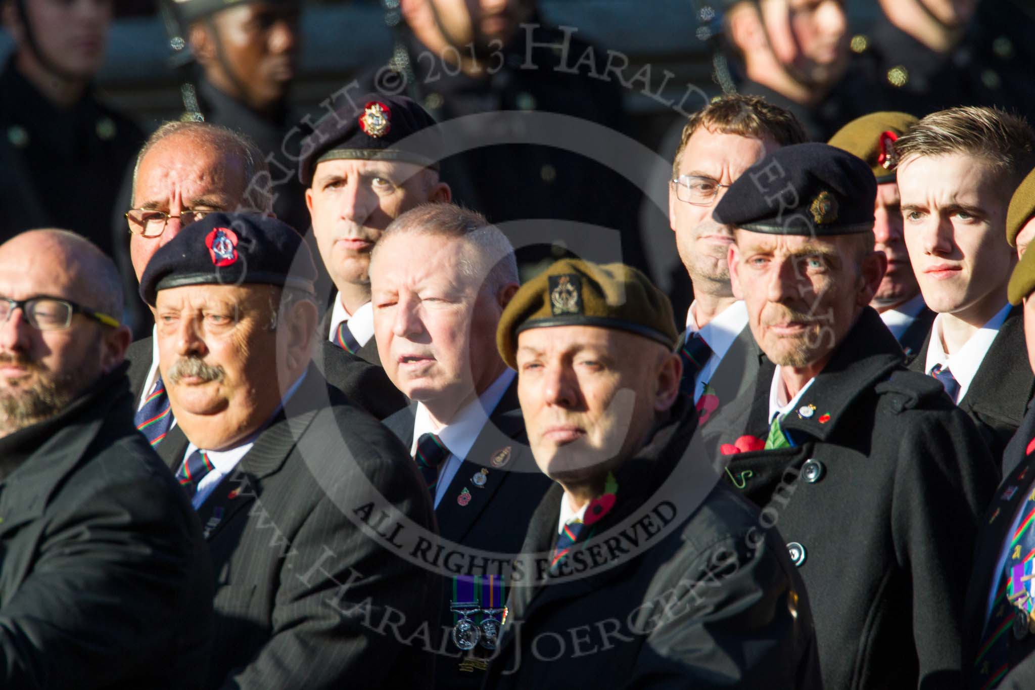 Remembrance Sunday at the Cenotaph in London 2014: Group B16 - Royal Pioneer Corps Association.
Press stand opposite the Foreign Office building, Whitehall, London SW1,
London,
Greater London,
United Kingdom,
on 09 November 2014 at 12:09, image #1681
