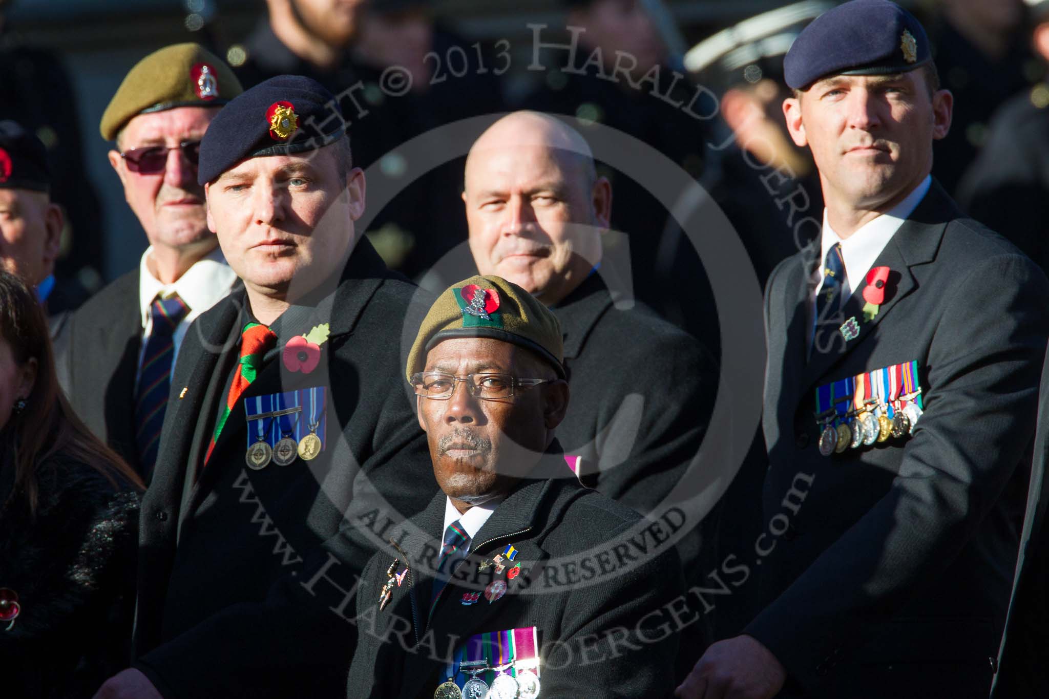 Remembrance Sunday at the Cenotaph in London 2014: Group B16 - Royal Pioneer Corps Association.
Press stand opposite the Foreign Office building, Whitehall, London SW1,
London,
Greater London,
United Kingdom,
on 09 November 2014 at 12:10, image #1692