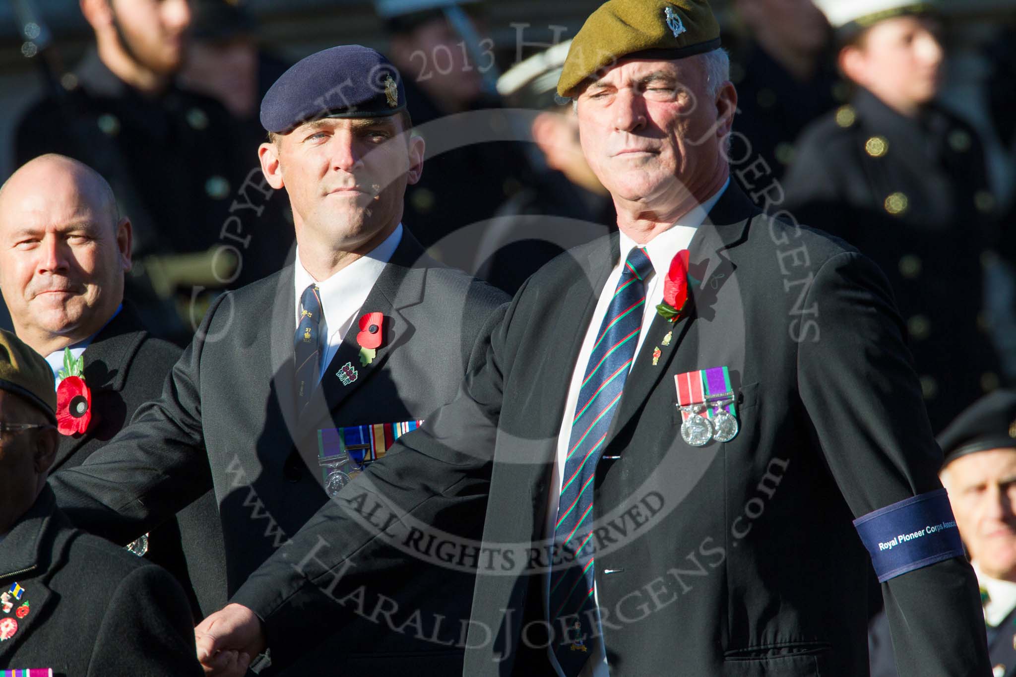 Remembrance Sunday at the Cenotaph in London 2014: Group B16 - Royal Pioneer Corps Association.
Press stand opposite the Foreign Office building, Whitehall, London SW1,
London,
Greater London,
United Kingdom,
on 09 November 2014 at 12:10, image #1693